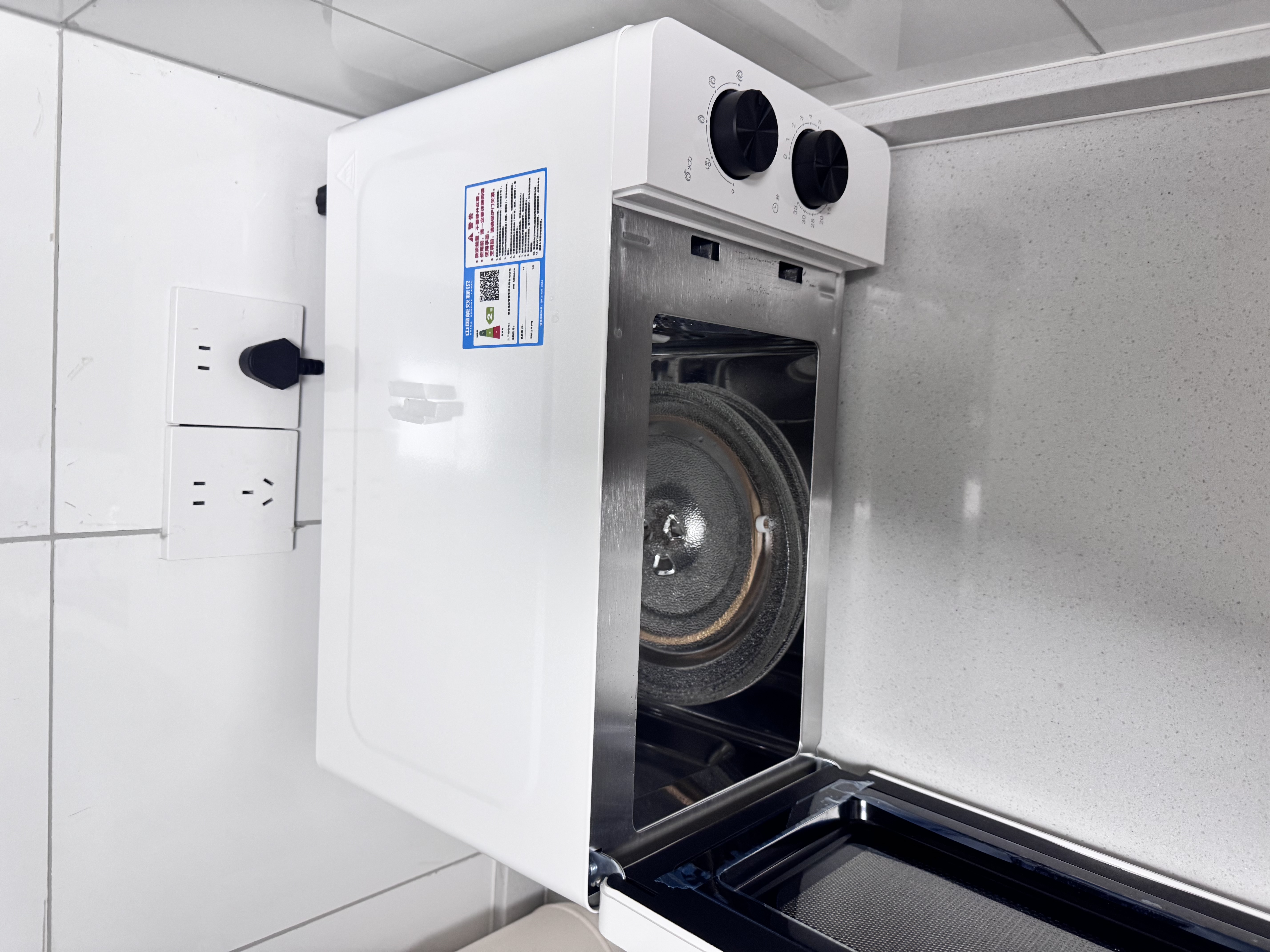 海尔（Haier）白巧不锈钢微波炉 0涂层360°转盘加热 旋转操作易洁耐用内胆 家用小型 老人适用 HW-M2003JW 实拍图