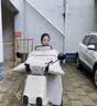 Rtako电动车挡风被冬季加厚2025新款加大保暖防风1500G加长护肩防水瓶 【米色】1500g 蜂窝棉 盖腿护肩 送称少一克免费退 实拍图
