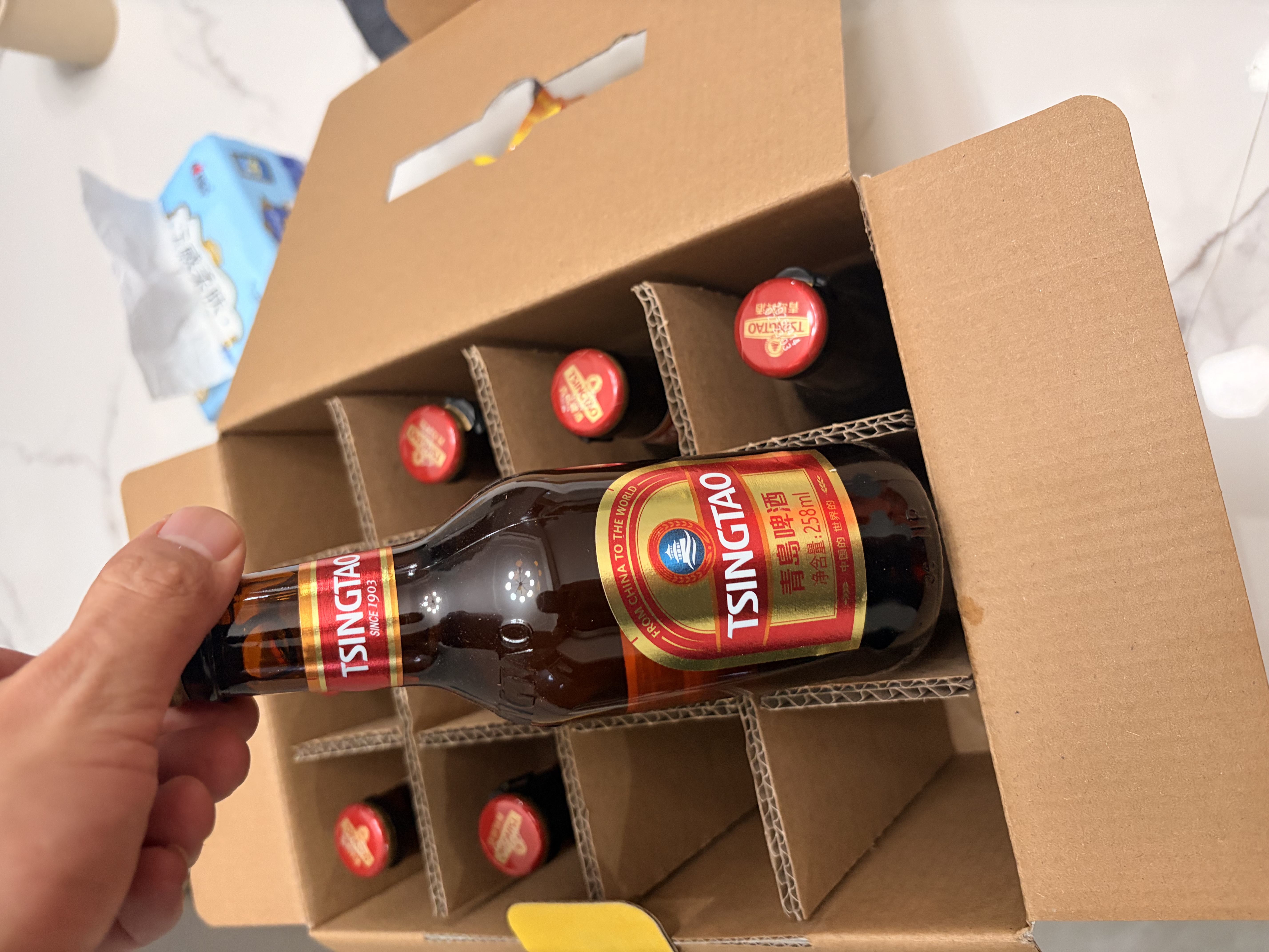 青岛啤酒（TsingTao）小棕金 拉环瓶盖设计 258ml*12瓶 整箱装 实拍图