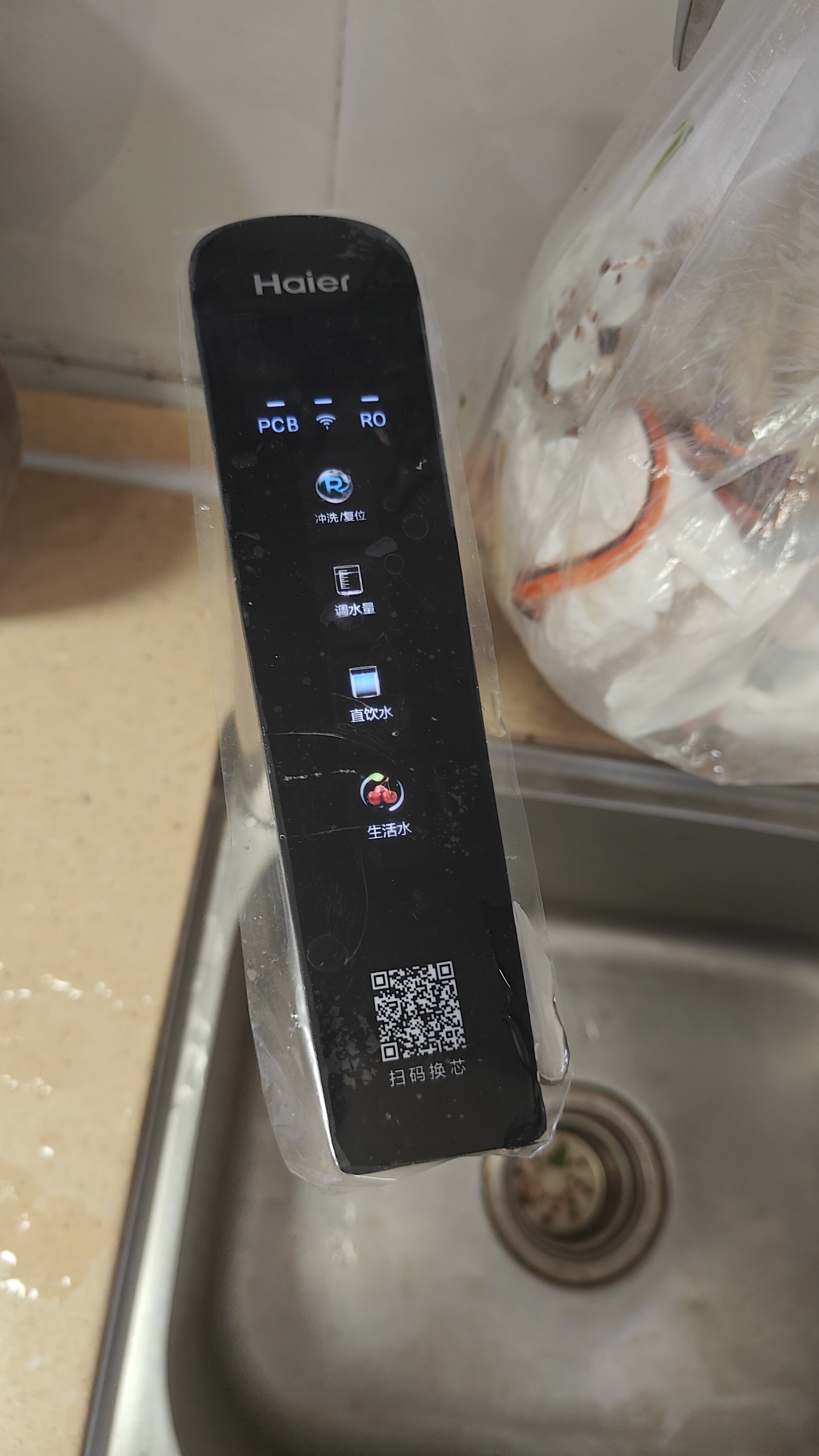 海尔（Haier）净水器鲜活水pro+瞬时1400G净水器家用抑菌反渗透智能触控龙头双出水厨房专用台下母婴净水机R883 实拍图