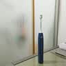 飞利浦（PHILIPS）声波电动牙刷 钻石3系 5倍洁齿5种模式 洁净亮白2刷头 送男士/女友 HX5181/02蓝 实拍图