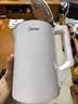 美的（Midea）电热水壶食品级304不锈钢自动断电双层防烫全钢无缝1.5L容量 MK-HJ1566 实拍图