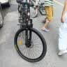 永久自行车成人山地车自行车学生男女铝合金变速公路自行车油碟单车 【钢架/全套轴承】黑金色 24速 26寸【推荐155-185cm】 实拍图