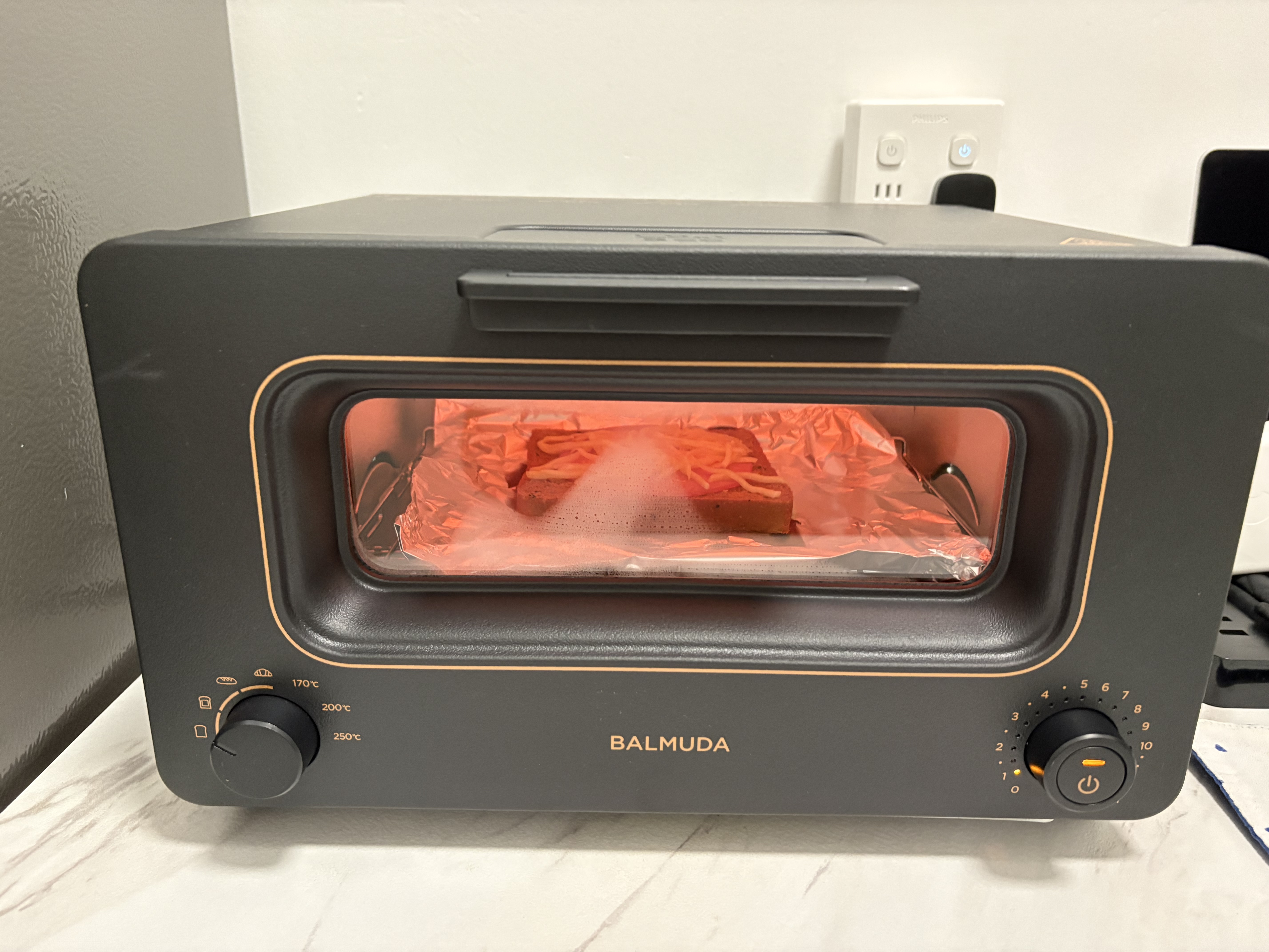 巴慕达（BALMUDA）蒸汽烤箱迷你小型多功能烘焙智能电烤箱家用办公室 面包蛋糕吐司鸡翅早餐机 黑色8L 实拍图