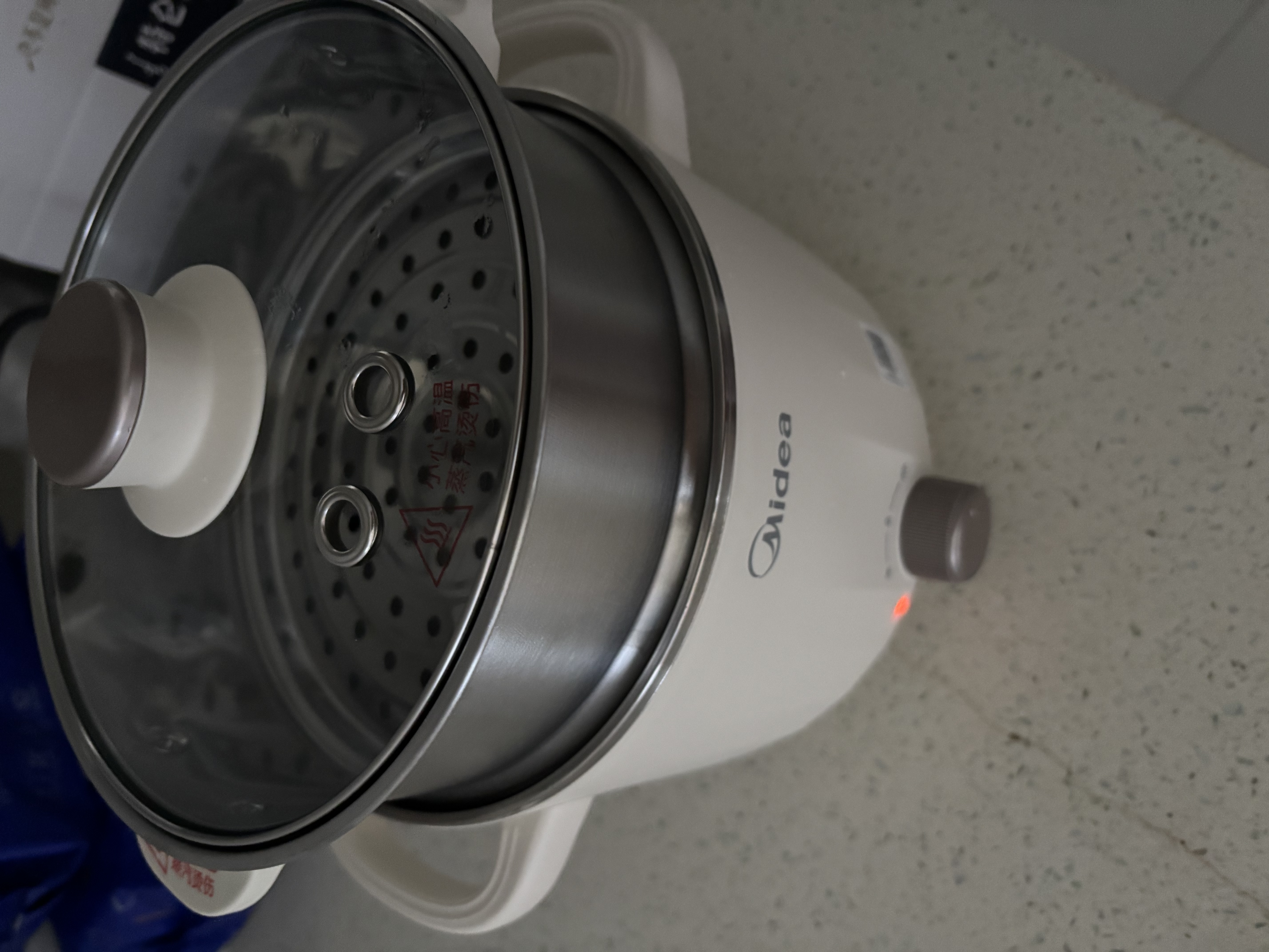 美的（Midea）电煮锅 0涂层不锈钢 宿舍小电锅 多功能家用宿舍泡面小火锅 2.6L蒸煮一体电热锅 XZC2066G 配蒸笼 实拍图