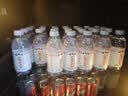 依云（evian）高端天然矿泉水 330ml*24硬瓶 法国原装进口饮用水 会议商务用水 实拍图