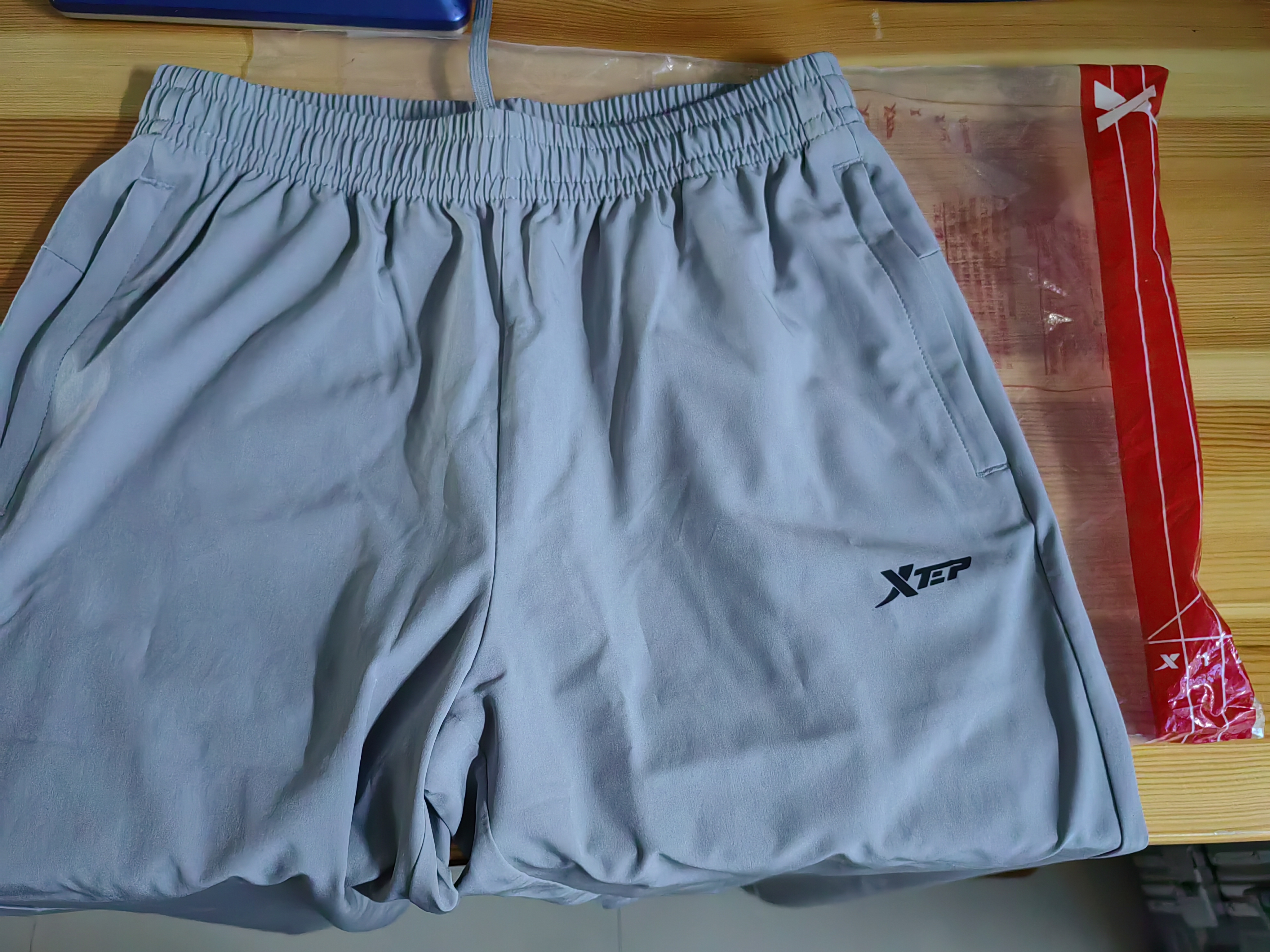 特步（XTEP）运动裤男裤春夏新款卫裤男士透气直筒针织长裤束脚裤体育休闲裤子 0209束脚-夏季-泥土灰 M 170 实拍图