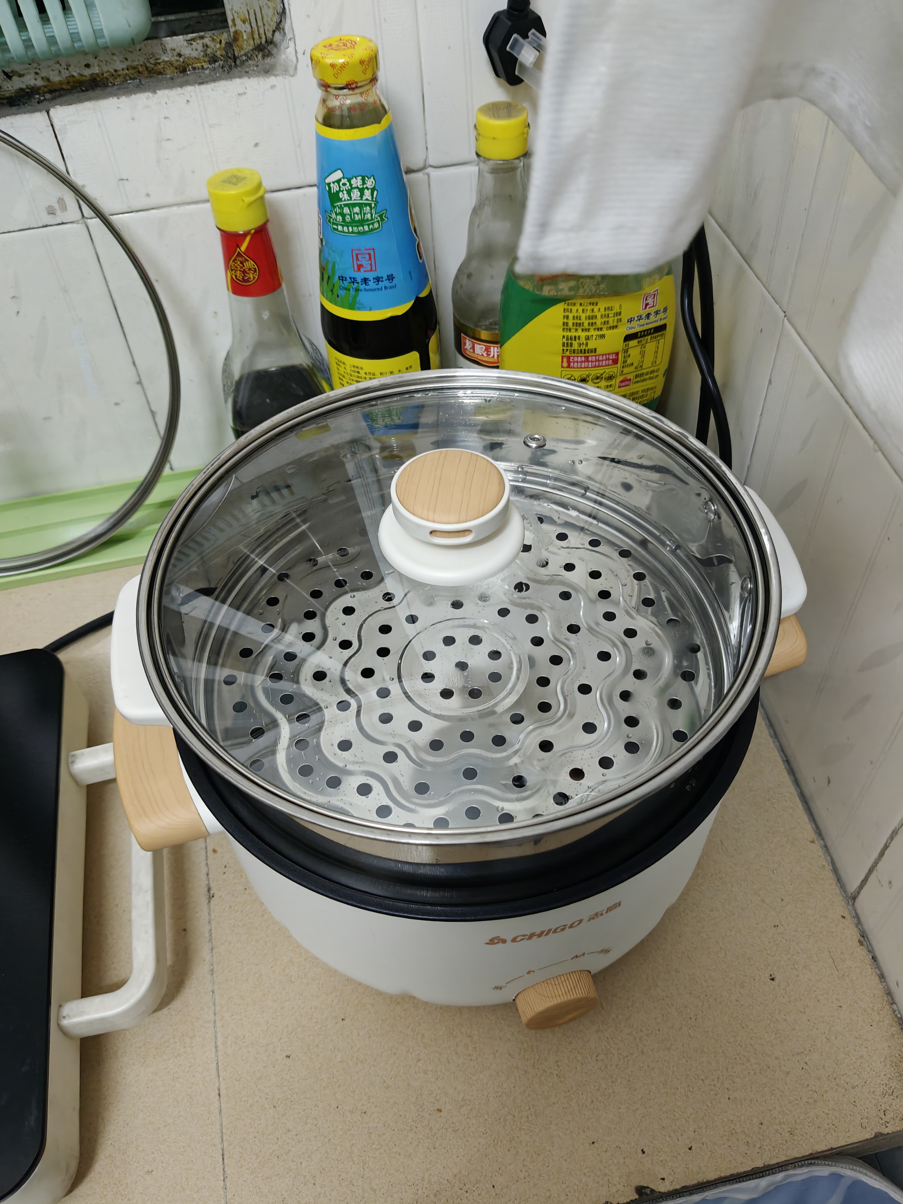志高（CHIGO）含钛电煮锅3L电锅一体多功能锅 宿舍泡面小电锅蒸煮一体多功能电火锅带蒸笼 DDS-24-1 实拍图