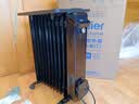 海尔（Haier）【石墨烯速热】11片电热油汀取暖器 家用电暖器加湿电暖气片全屋升温移动烘衣防烫烤火炉 HNY-1101 实拍图