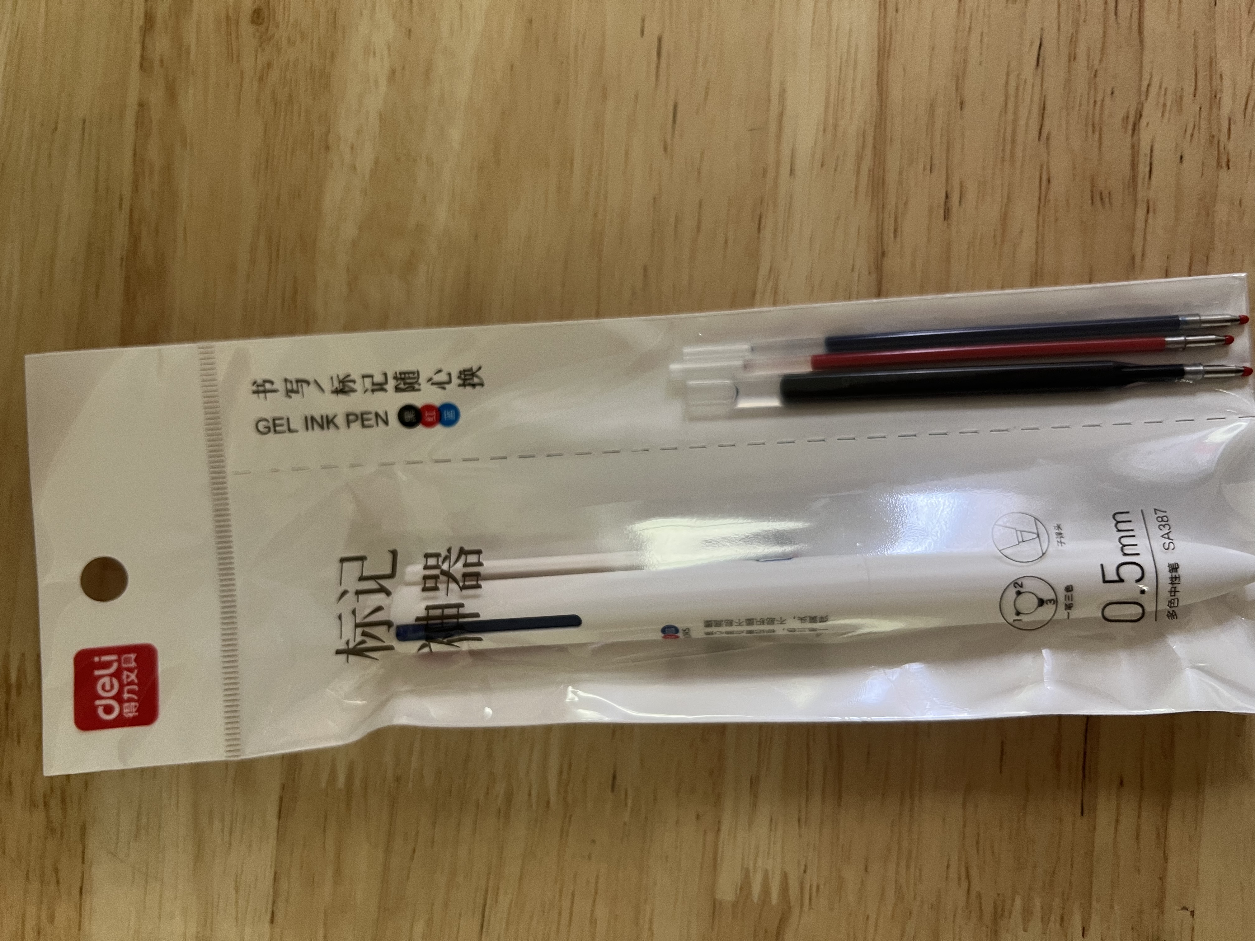 得力（deli）开学必备三色笔按动中性笔黑蓝红 0.5mm多功能子弹头学生日常书写标注学习套装1笔+3芯SA387 实拍图