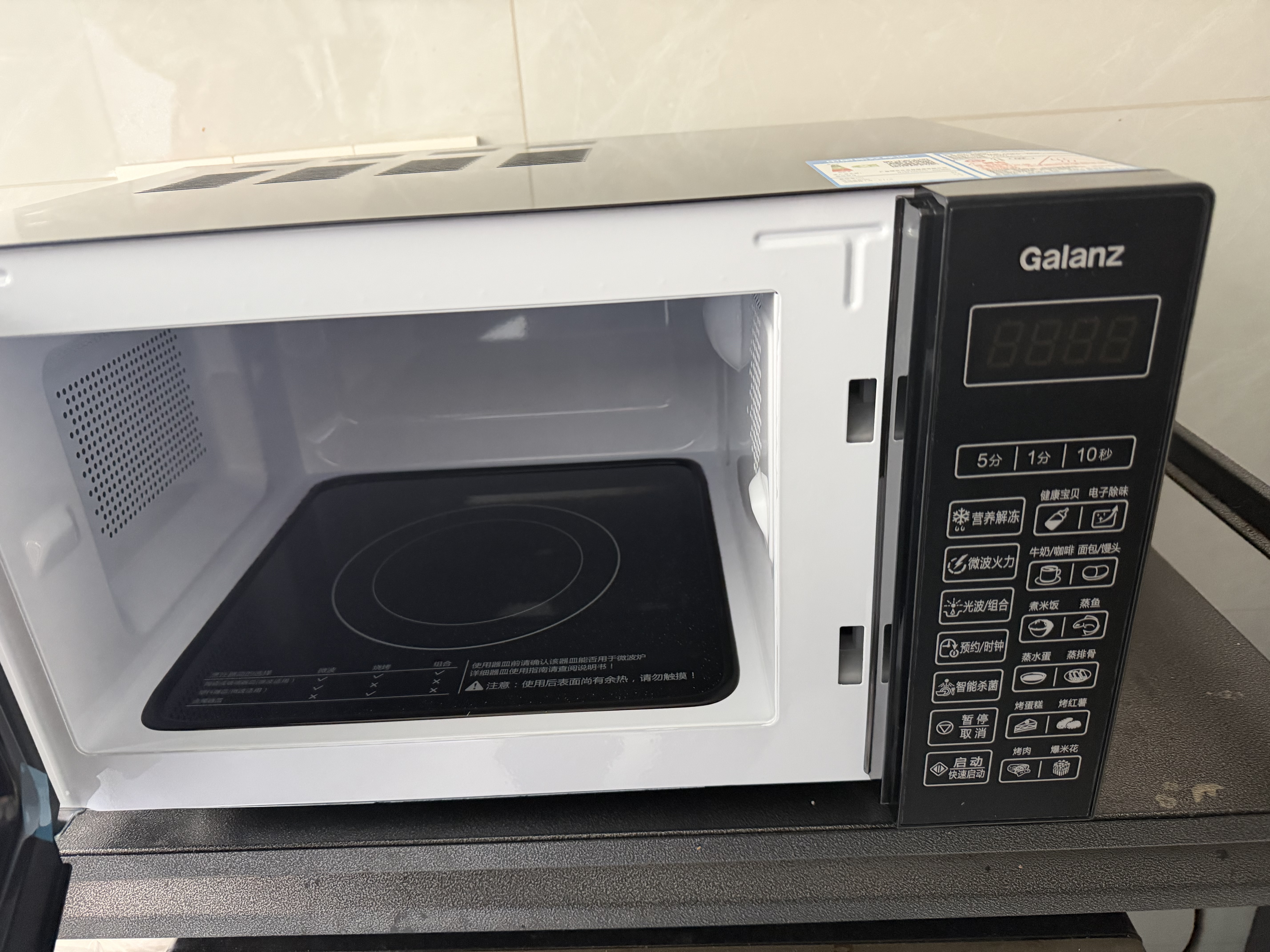 格兰仕（Galanz）微波炉烤箱一体机光波20L家用700W节能平板易清洁智能菜单多功能小型烧烤解冻预约 2026新款 DG 全新机器 实拍图