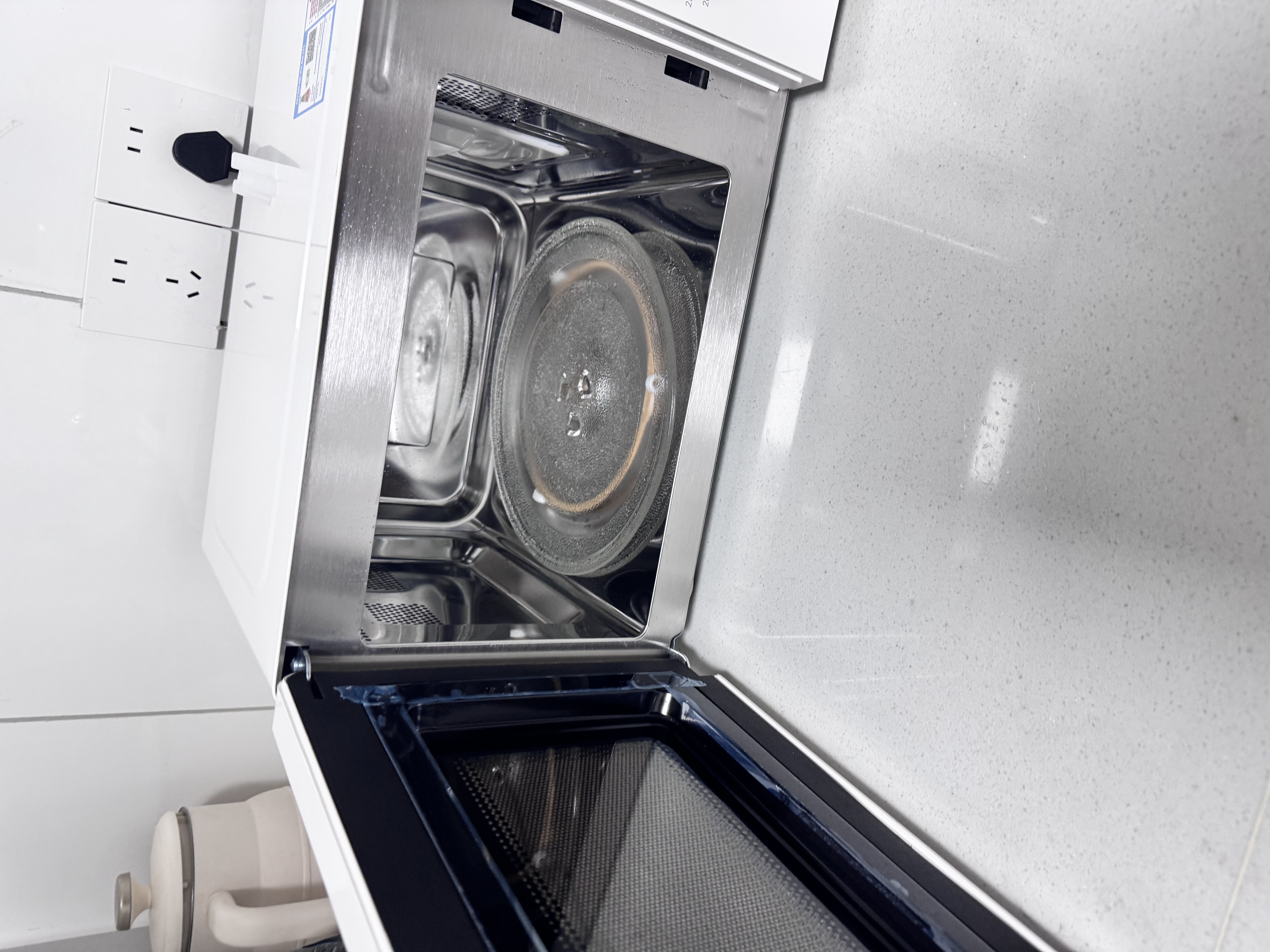 海尔（Haier）白巧不锈钢微波炉 0涂层360°转盘加热 旋转操作易洁耐用内胆 家用小型 老人适用 HW-M2003JW 实拍图