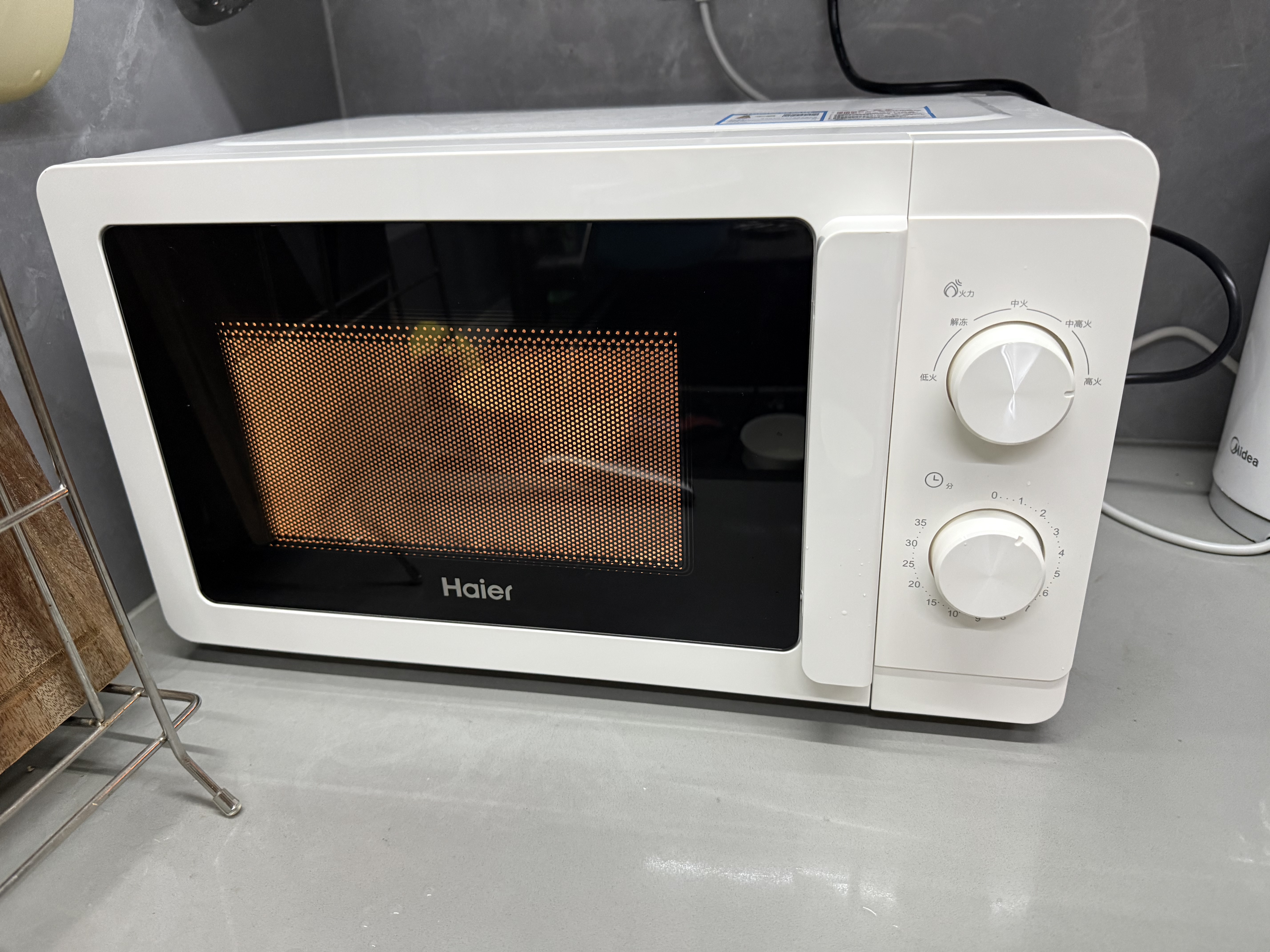 海尔（Haier）【金榜推荐】快捷微波炉 360°转盘加热 汉玉白旋转操作 易洁内胆 家用小型 老人适用 HW-M20T1W 实拍图