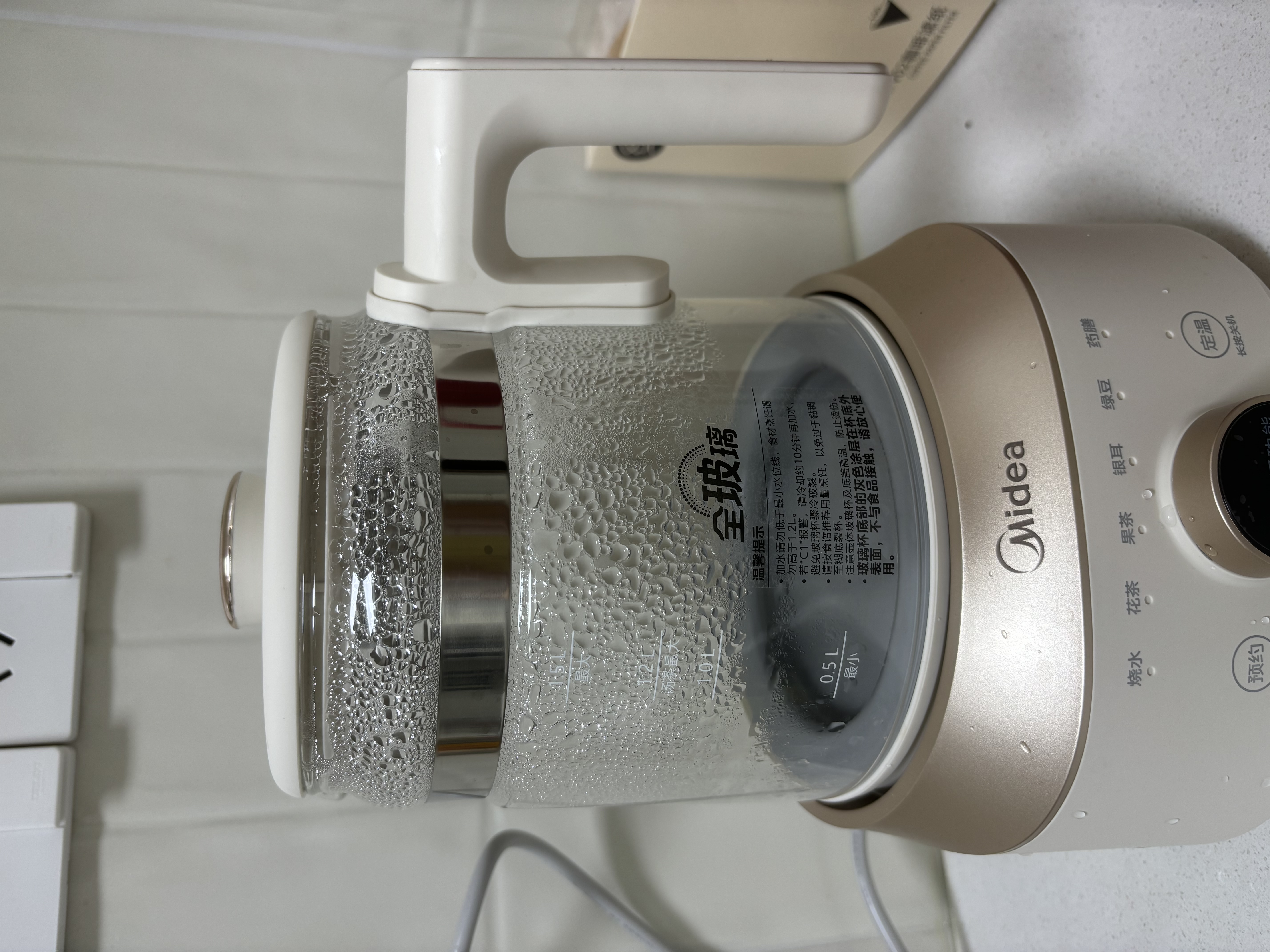 美的（Midea）养生壶全玻璃0涂层全自动烧水壶母婴恒温泡奶机电热水壶花茶壶辅食机全包护底防碎1.5L YS15B201 实拍图