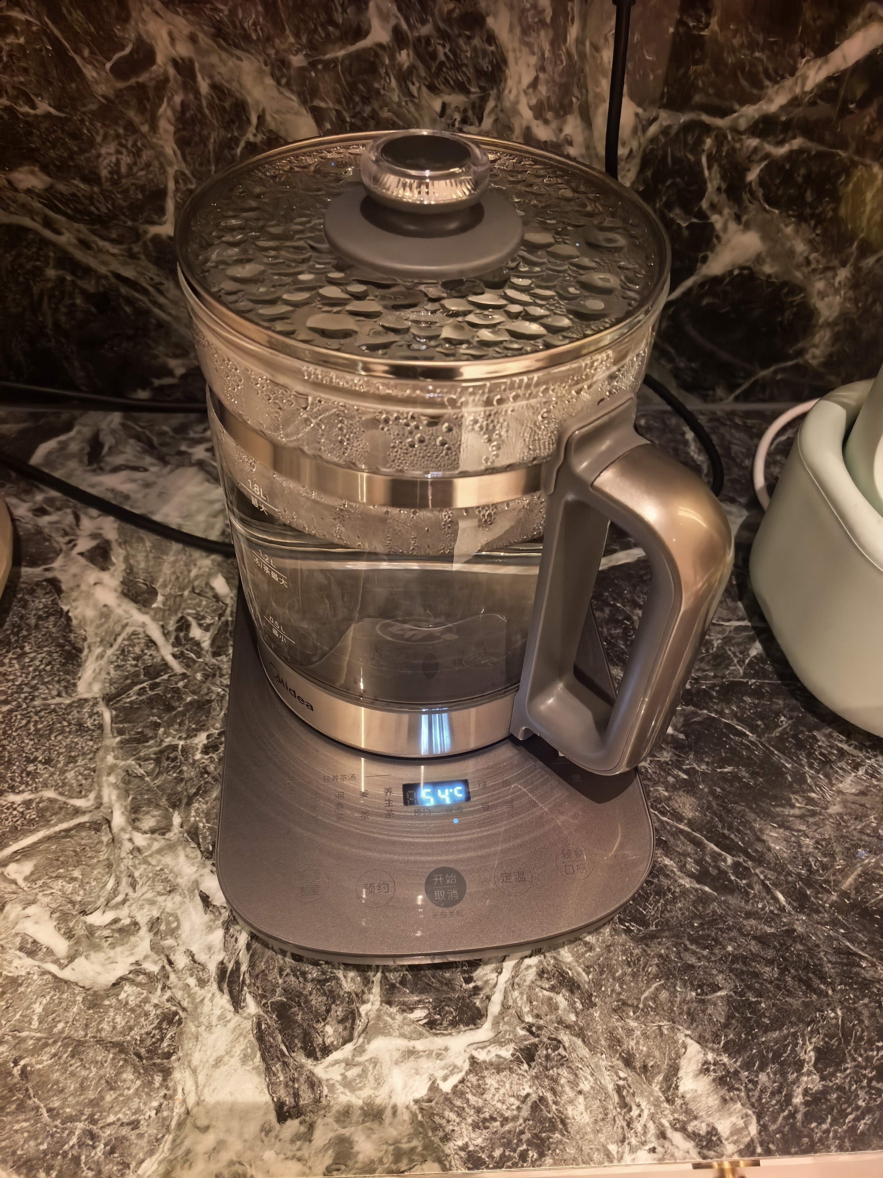美的（Midea）纯钛养生壶 1.8L全自动大容量烧水壶纯钛茶篮 家用泡奶机电热水壶 恒温煮茶壶YS18P305-Ti 实拍图