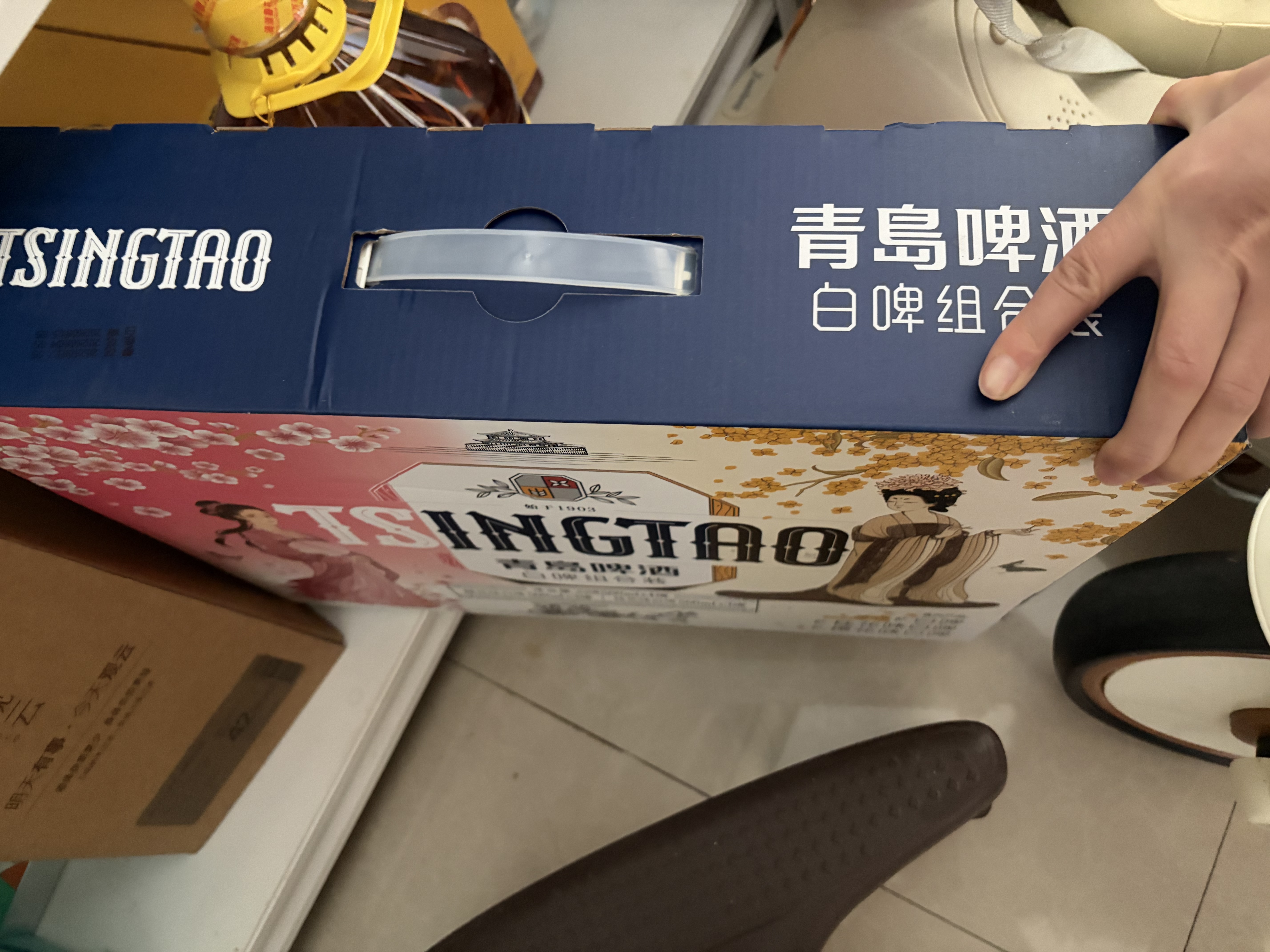 青岛啤酒（TsingTao）精酿白啤500ml*10罐礼盒装(白啤*4+樱花*3+桂花*3) 实拍图