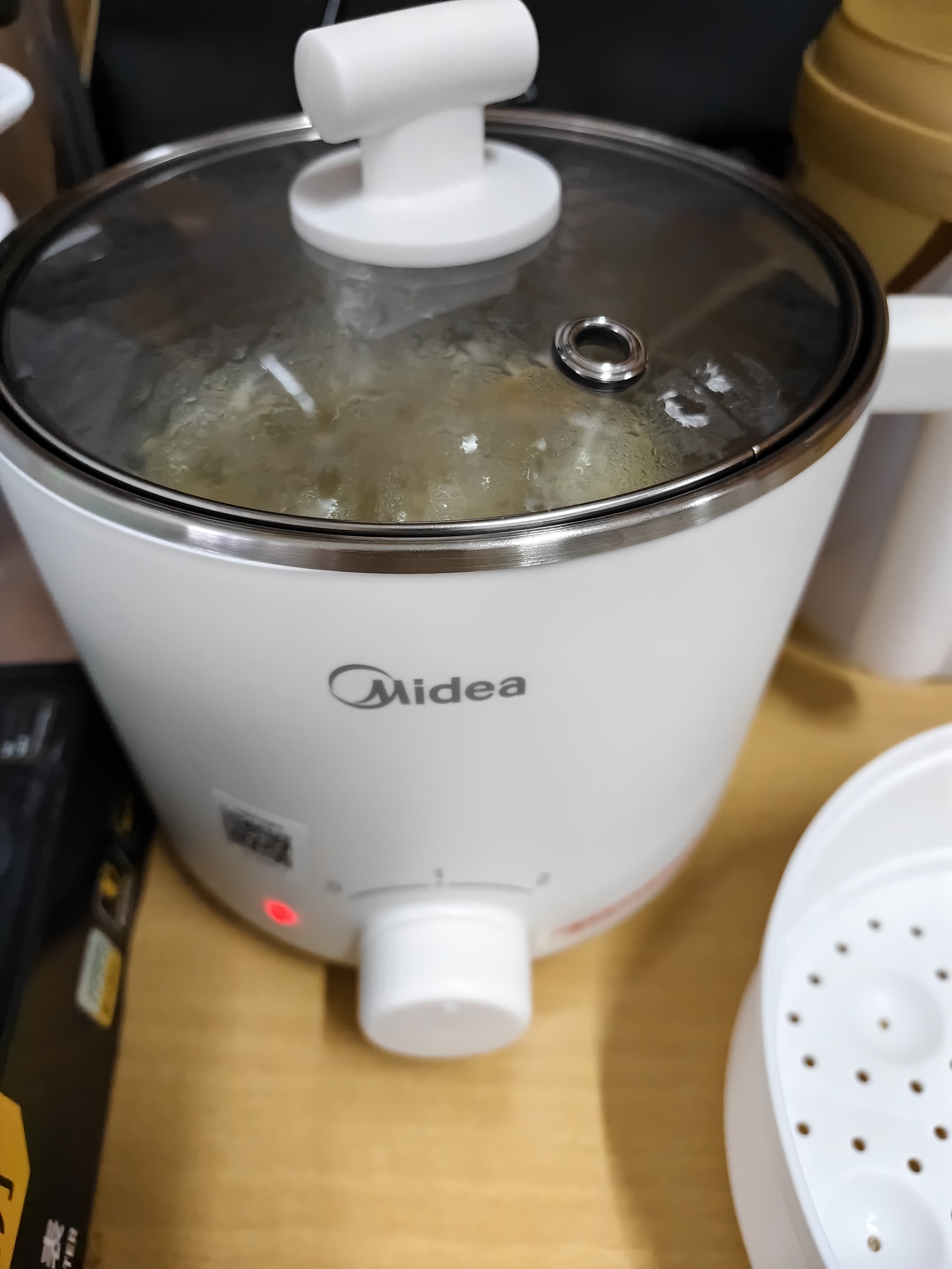 美的（Midea）【直营】宿舍电煮锅不锈钢小型多功能一锅多用泡面锅小型迷你电煮锅小电锅便携式煮面锅电火锅 1.7L 【带蒸笼 304内胆】XZE1614 实拍图