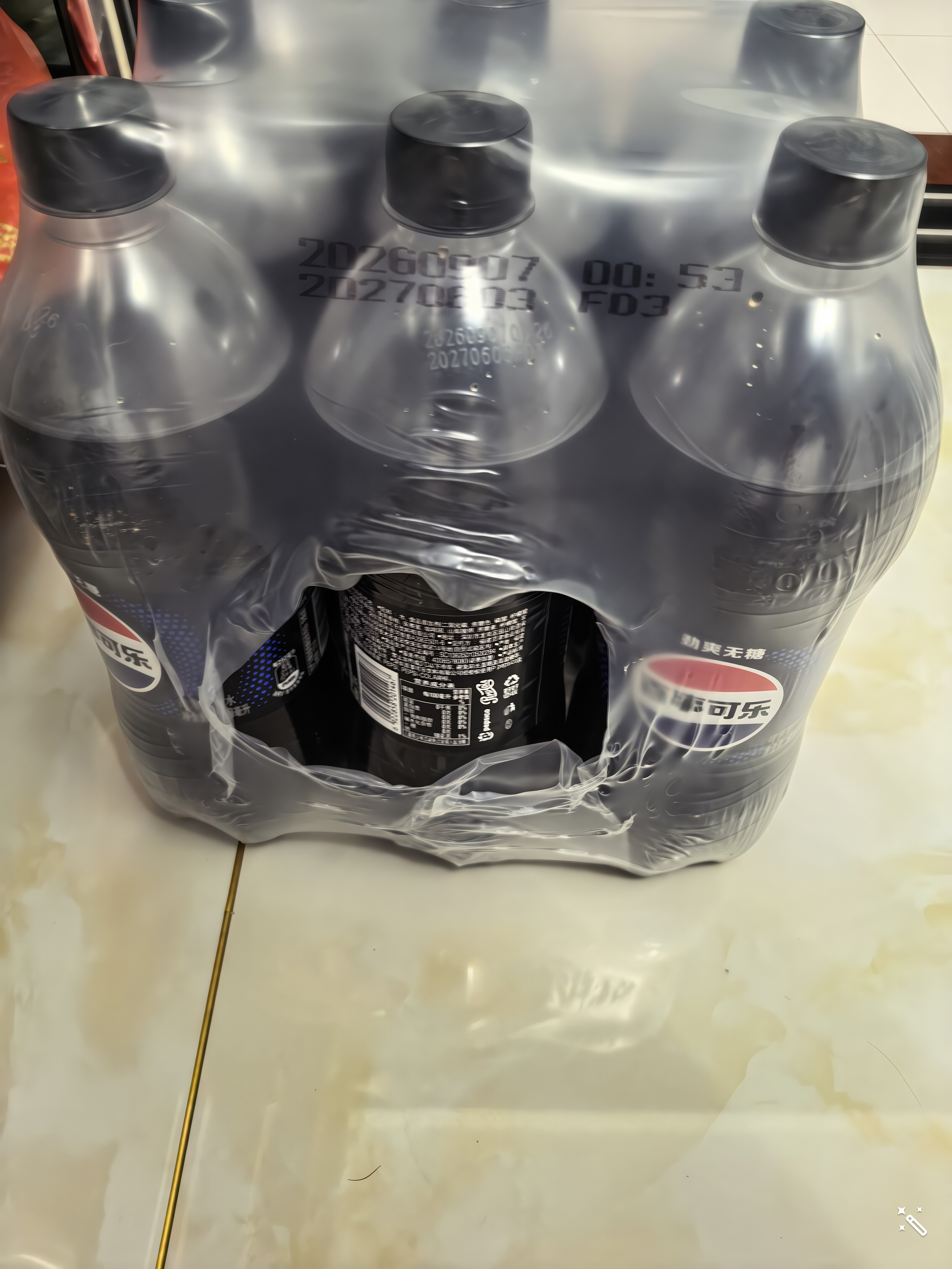 百事可乐Pepsi 无糖可乐 碳酸饮料汽水 900ml*12瓶 家庭聚会（随机包装） 实拍图