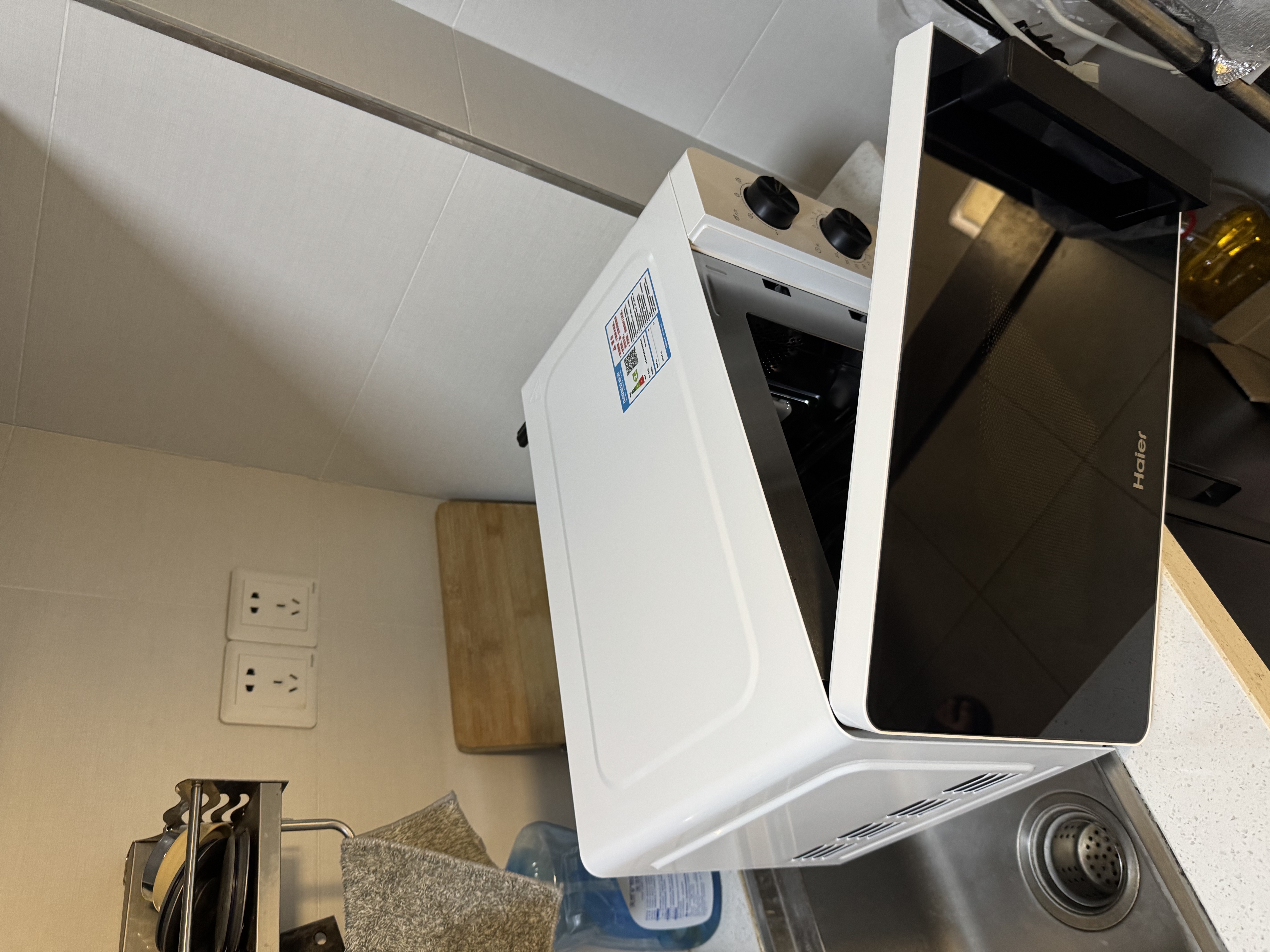 海尔（Haier）白巧不锈钢微波炉 0涂层360°转盘加热 旋转操作易洁耐用内胆 家用小型 老人适用 HW-M2003JW 实拍图