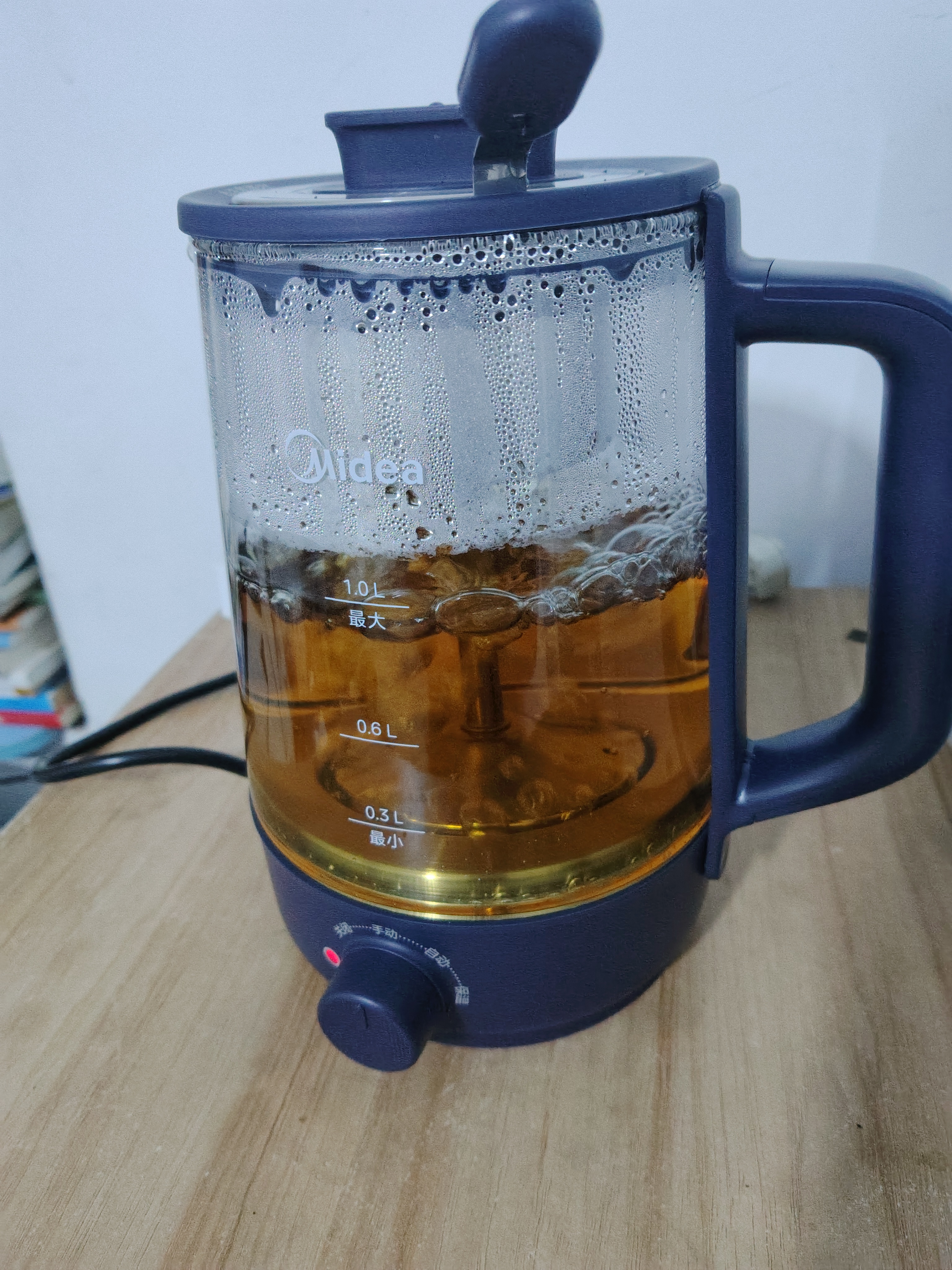 美的（Midea）养生壶 1L大容量一体式喷淋煮茶器蒸煮茶壶 办公室煮茶烧水一体机 304不锈钢恒温水壶ZC10S01 实拍图