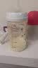 贝亲（Pigeon）防胀气 自然成长翻盖直饮吸管 大童奶瓶330ml 马戏团 18月+ AA279 实拍图