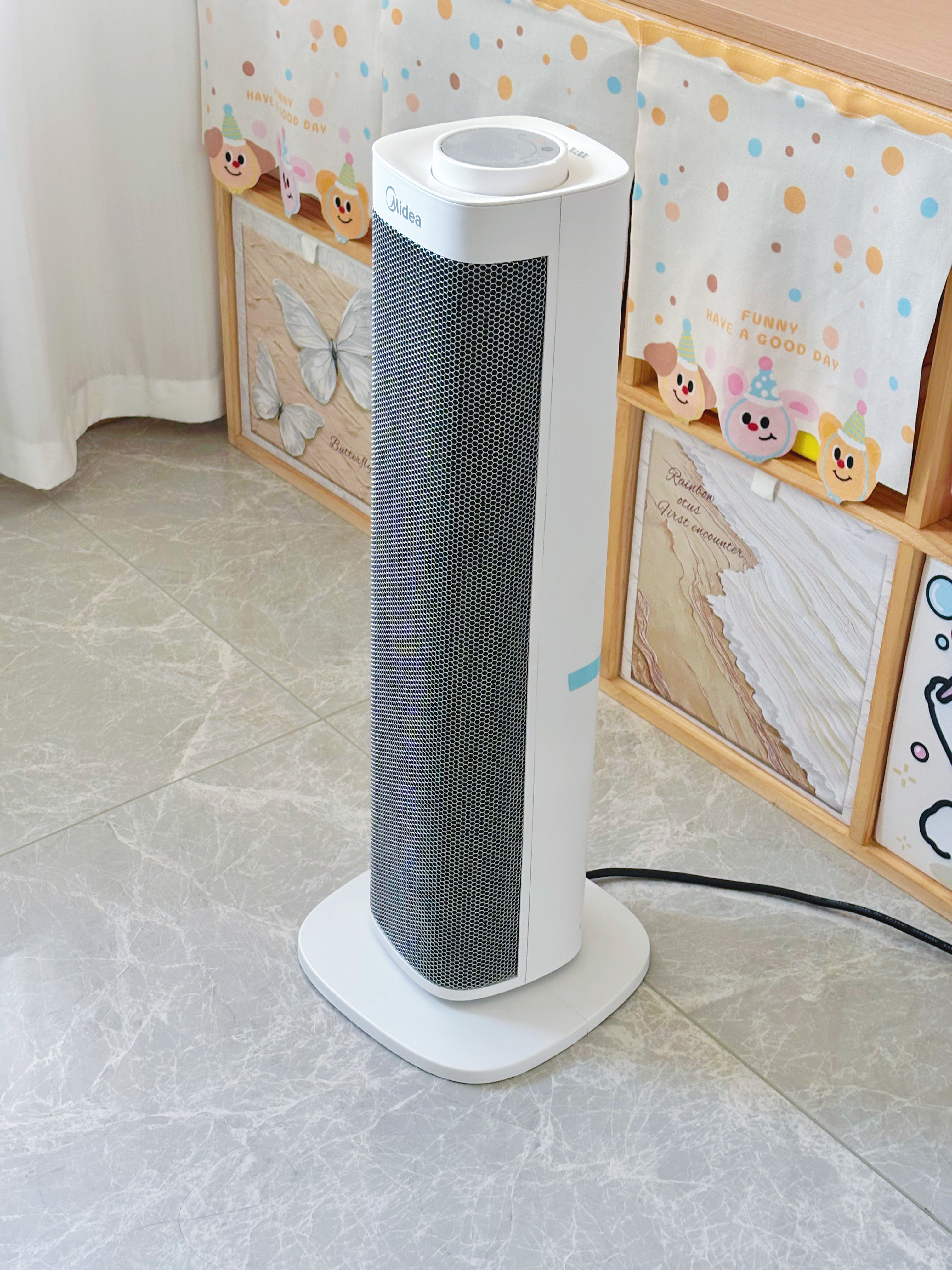 美的（Midea）取暖器立式暖风机电暖气家用电暖器小太阳烤火器浴室热风机节能大功率新款低噪办公室卧室速热干衣 【热销爆款】新型石墨烯 实拍图