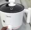 美的（Midea）电煮锅 电热锅 小电锅 宿舍小锅 学生寝室一体泡面小火锅多功能锅 1.7L 电煮锅小型1-2人 XZE1612 实拍图