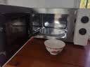 海尔（Haier）白巧不锈钢微波炉 0涂层360°转盘加热 旋转操作易洁耐用内胆 家用小型 老人适用 HW-M2003JW 实拍图