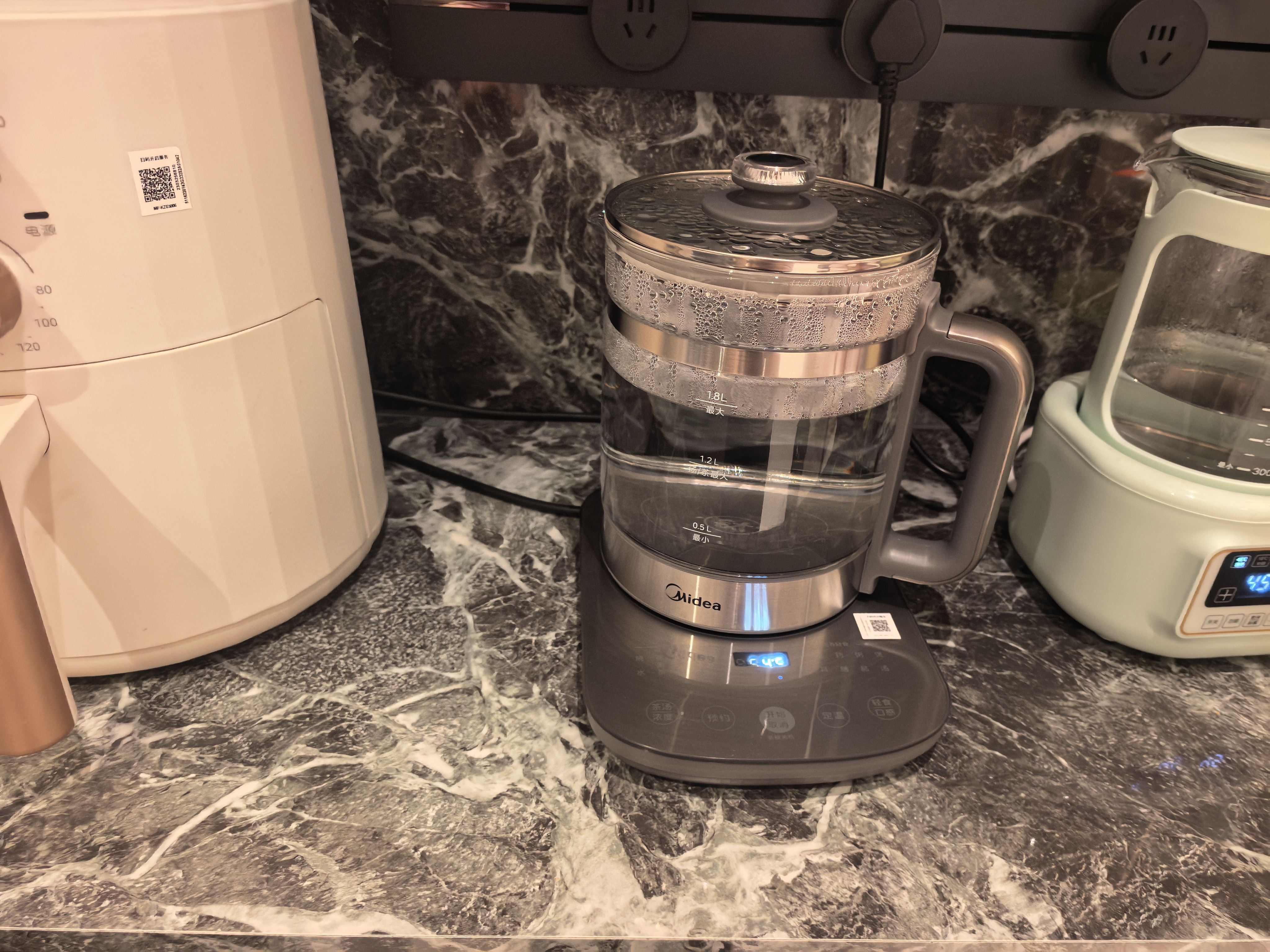 美的（Midea）纯钛养生壶 1.8L全自动大容量烧水壶纯钛茶篮 家用泡奶机电热水壶 恒温煮茶壶YS18P305-Ti 实拍图