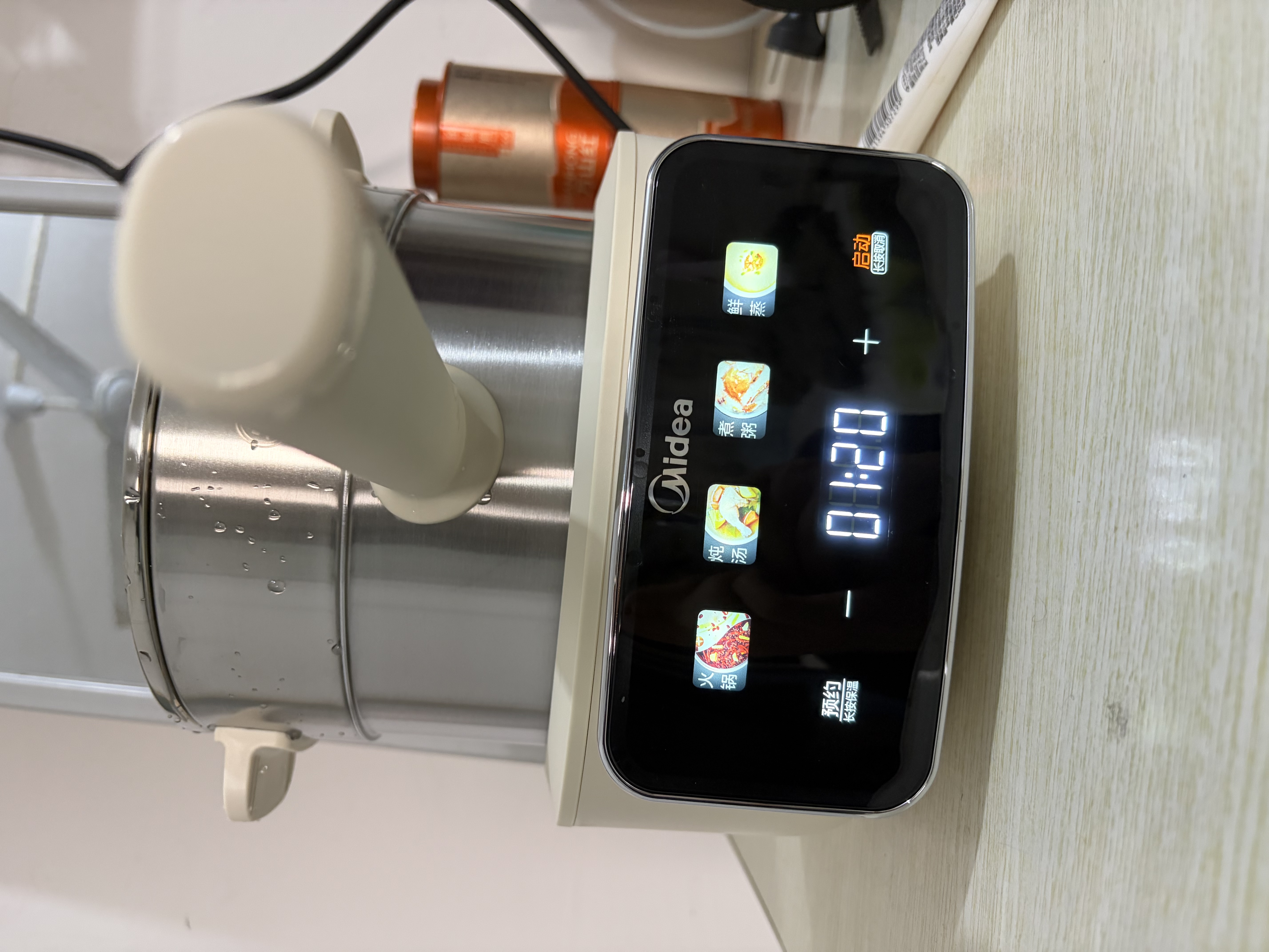 美的（Midea）电煮锅 电蒸锅 分体式小电锅 0涂层不锈钢电煮锅  2-3人家用蒸煮一体多功能锅 2.6L配蒸笼 XZC2071 实拍图