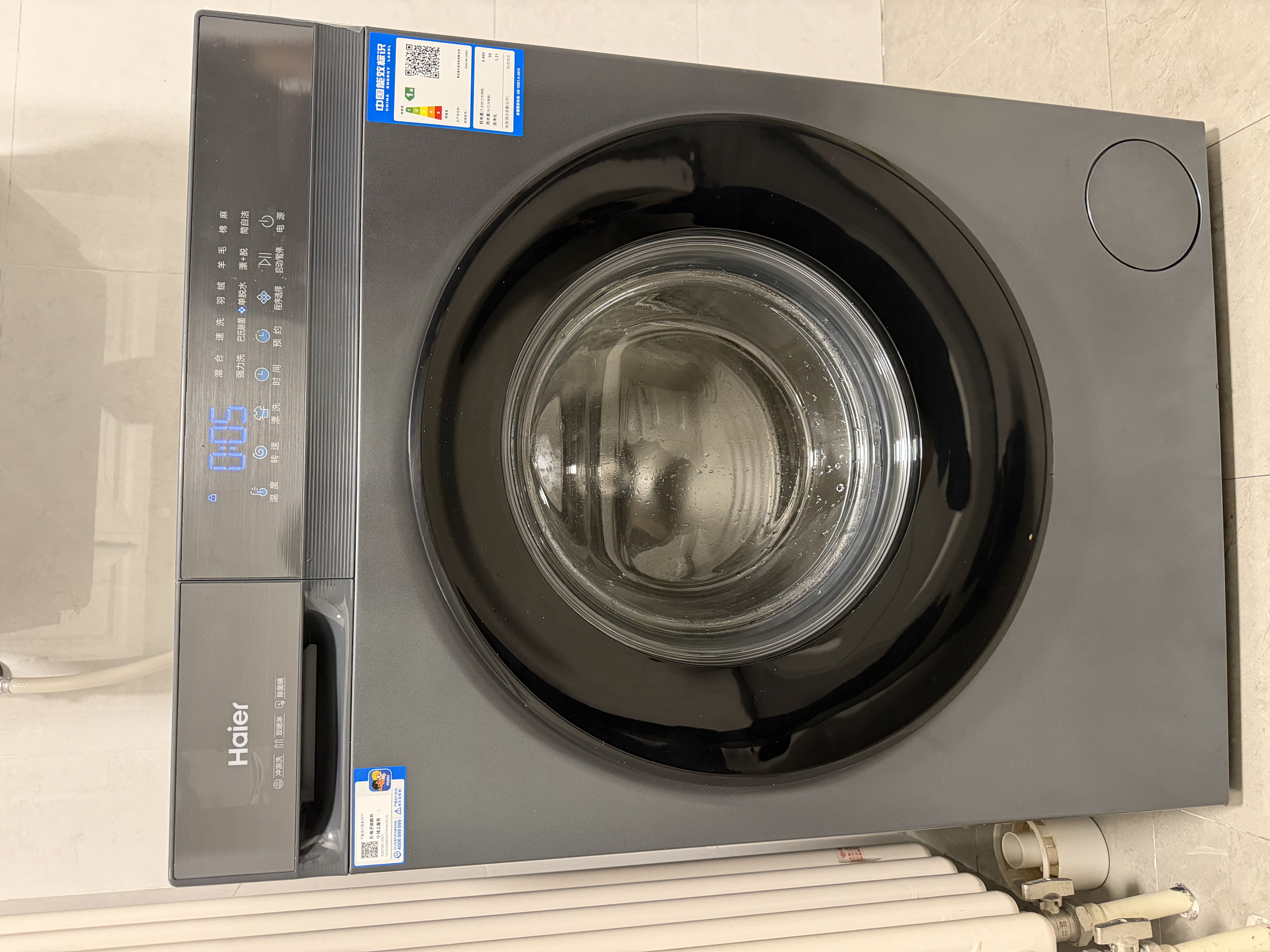海尔（Haier）滚筒洗衣机全自动单洗家用 10公斤大容量超薄 家电补贴 电器换新 小青柑系列 XQG100-2AD1 实拍图