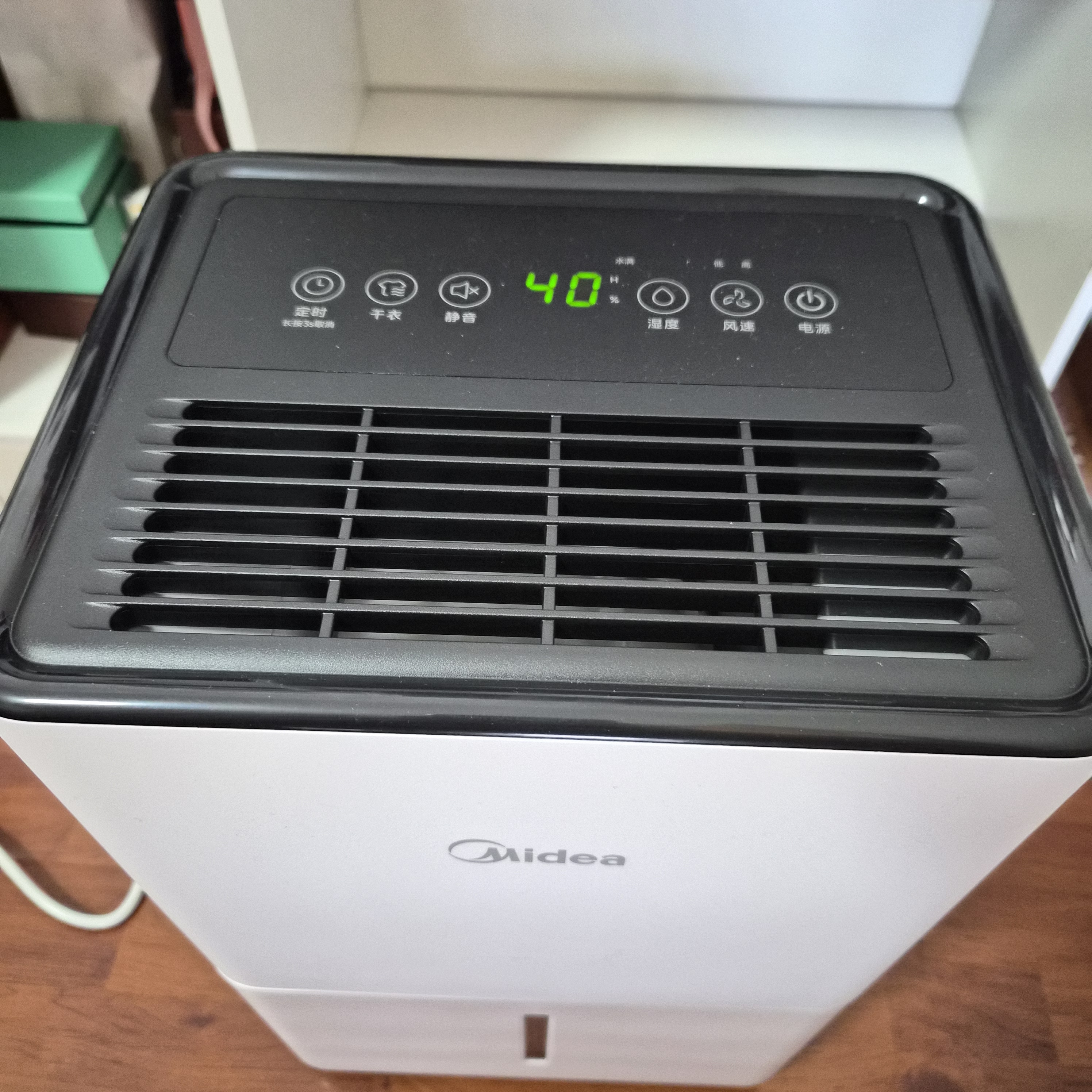 美的（Midea）除湿机/抽湿机12升/天 自营家用20㎡轻音小型回南天客厅卧室内防潮专用干衣吸湿器CF12BD/N7-DO 实拍图