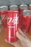 可口可乐（Coca-Cola）经典口味 汽水饮料 碳酸饮料 330ml*24摩登/主题罐 随机发货 实拍图