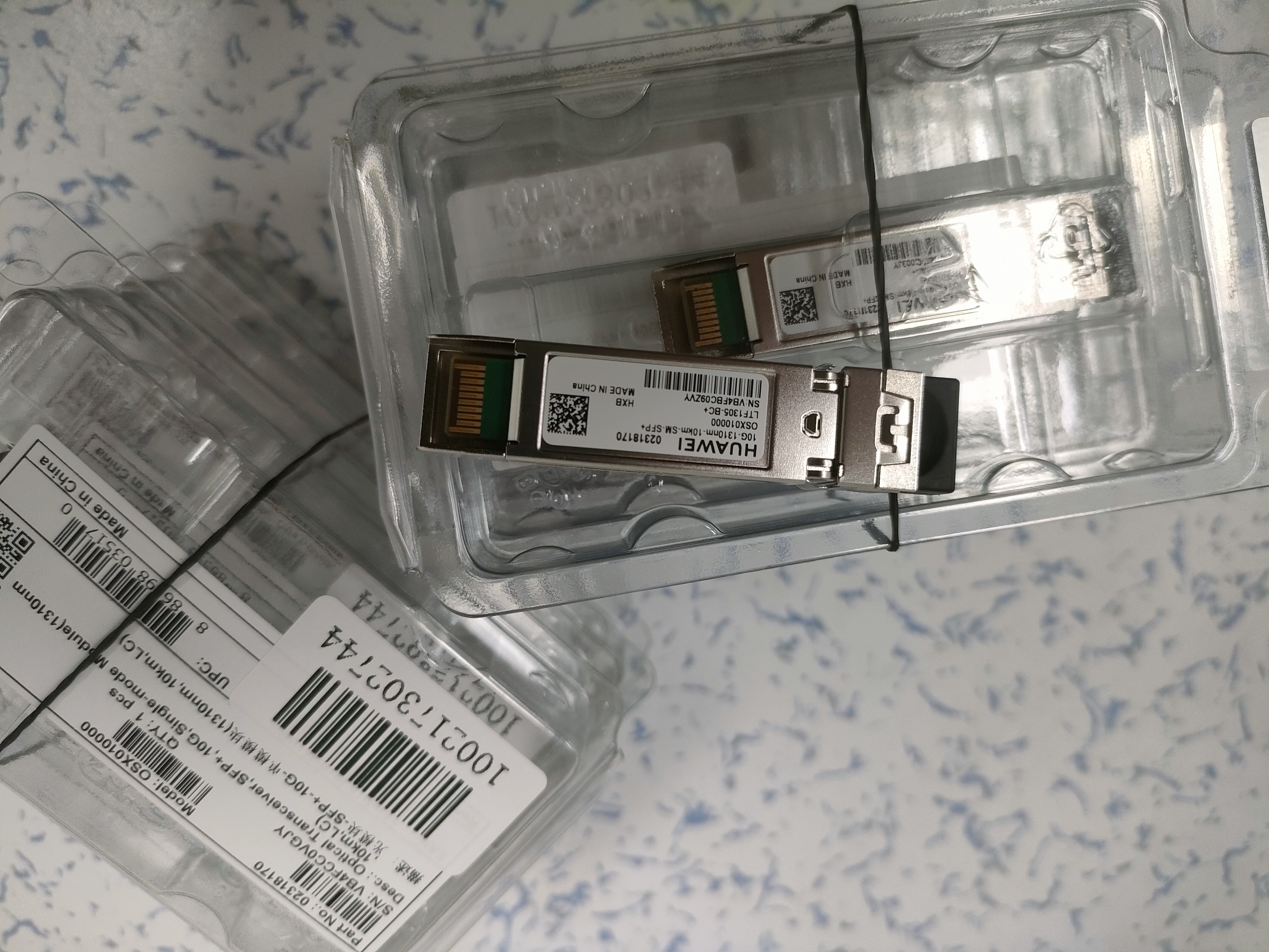 华为（HUAWEI）万兆光模块-SFP+-10G-单模模块(1310nm,10km,LC) 交换机万兆单模 搭配双芯光纤 双LC接头OSX010000 实拍图