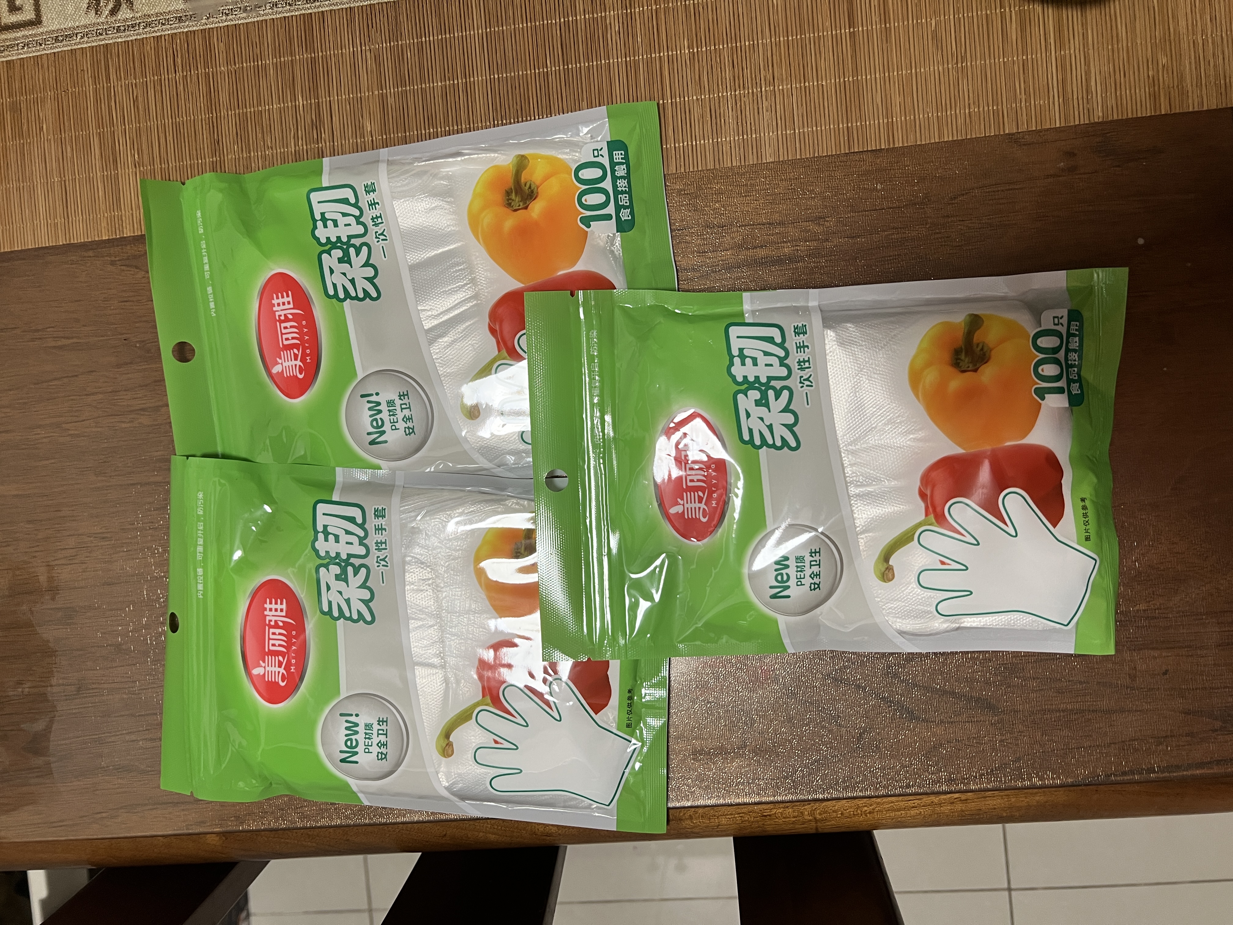 美丽雅一次性手套200只食品用抽取式塑料pe加厚防漏家用厨房透明薄膜 实拍图