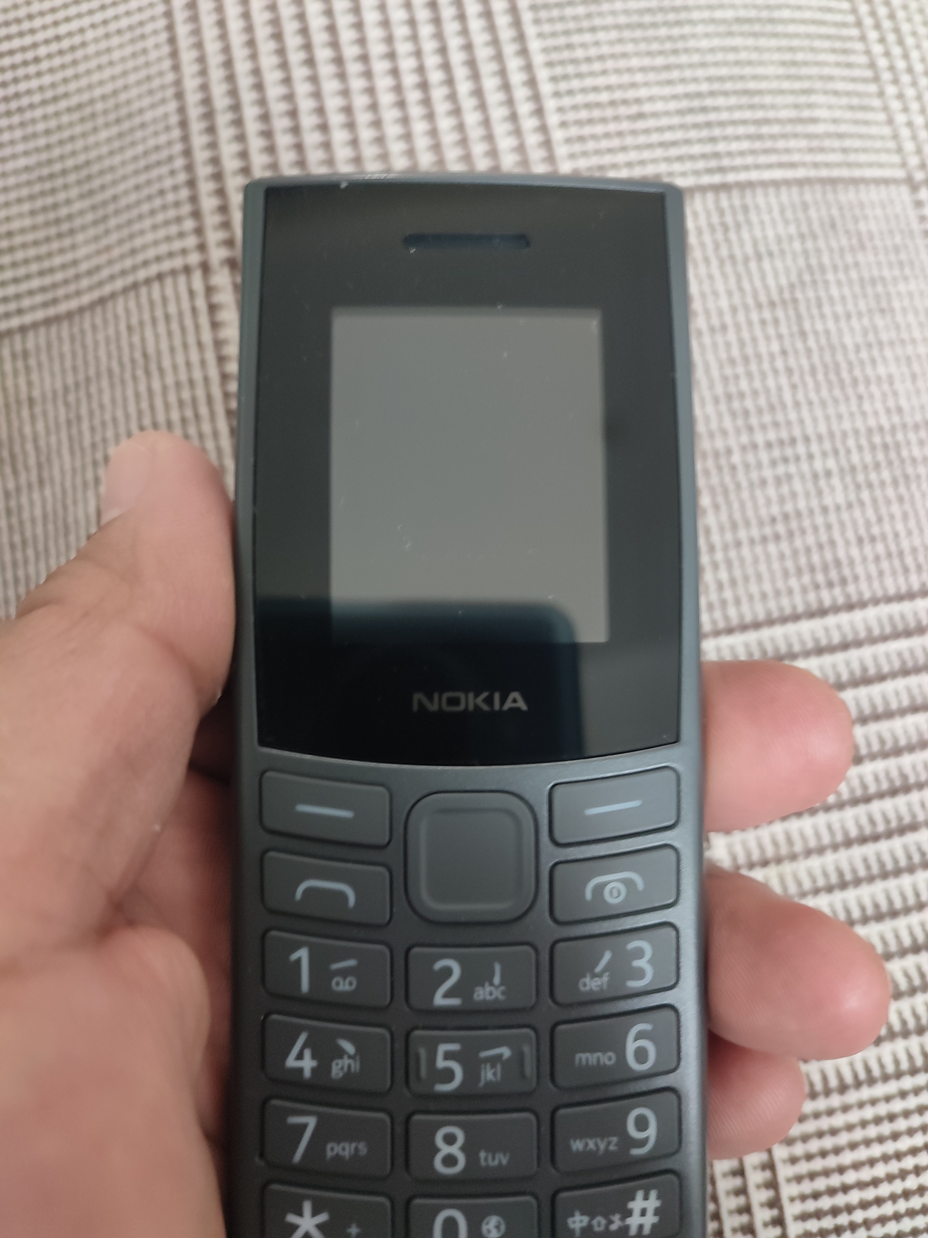 诺基亚（NOKIA）新105 4G 全网通移动联通电信 老人老年按键直板学生儿童备用戒网手机 双卡双待  黑色 实拍图
