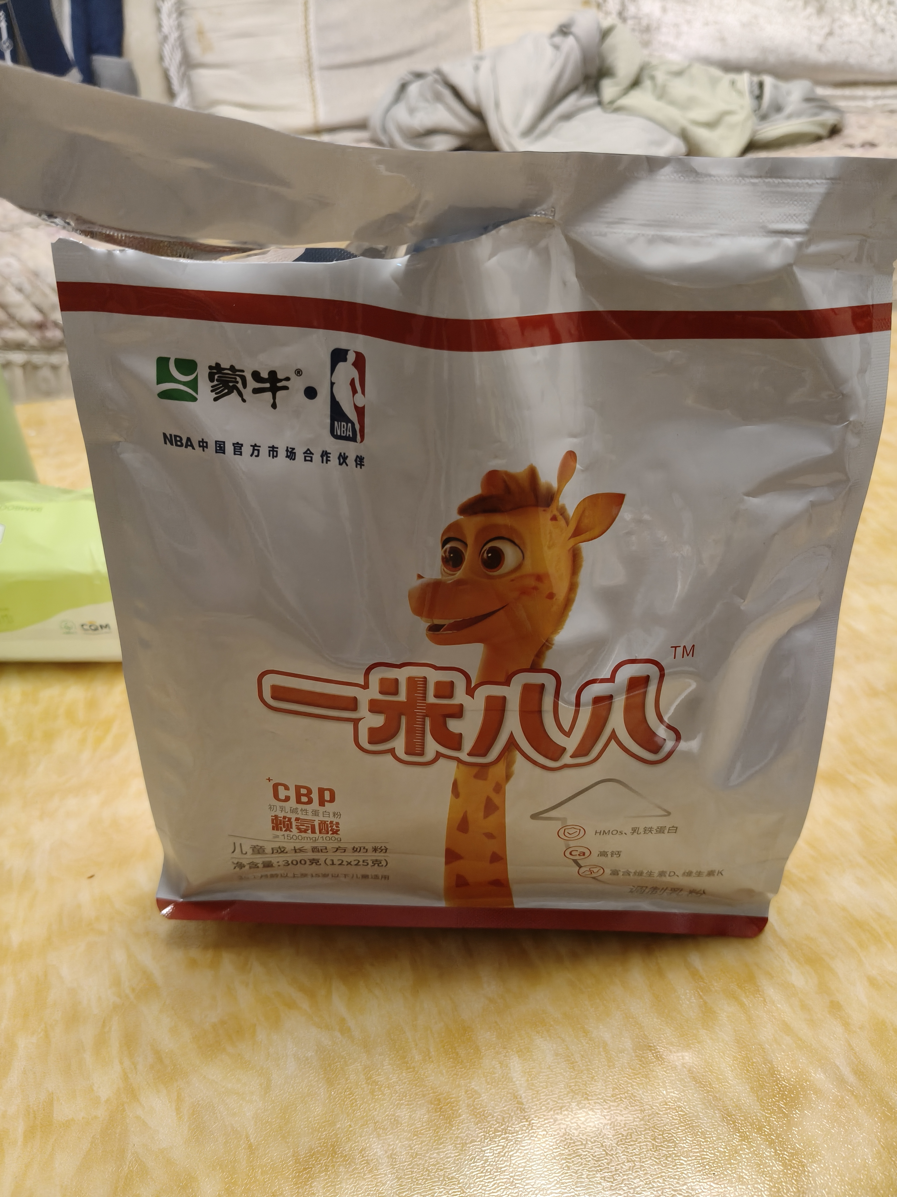 蒙牛一米八八儿童奶粉CBP赖氨酸3-15岁300g袋装 实拍图