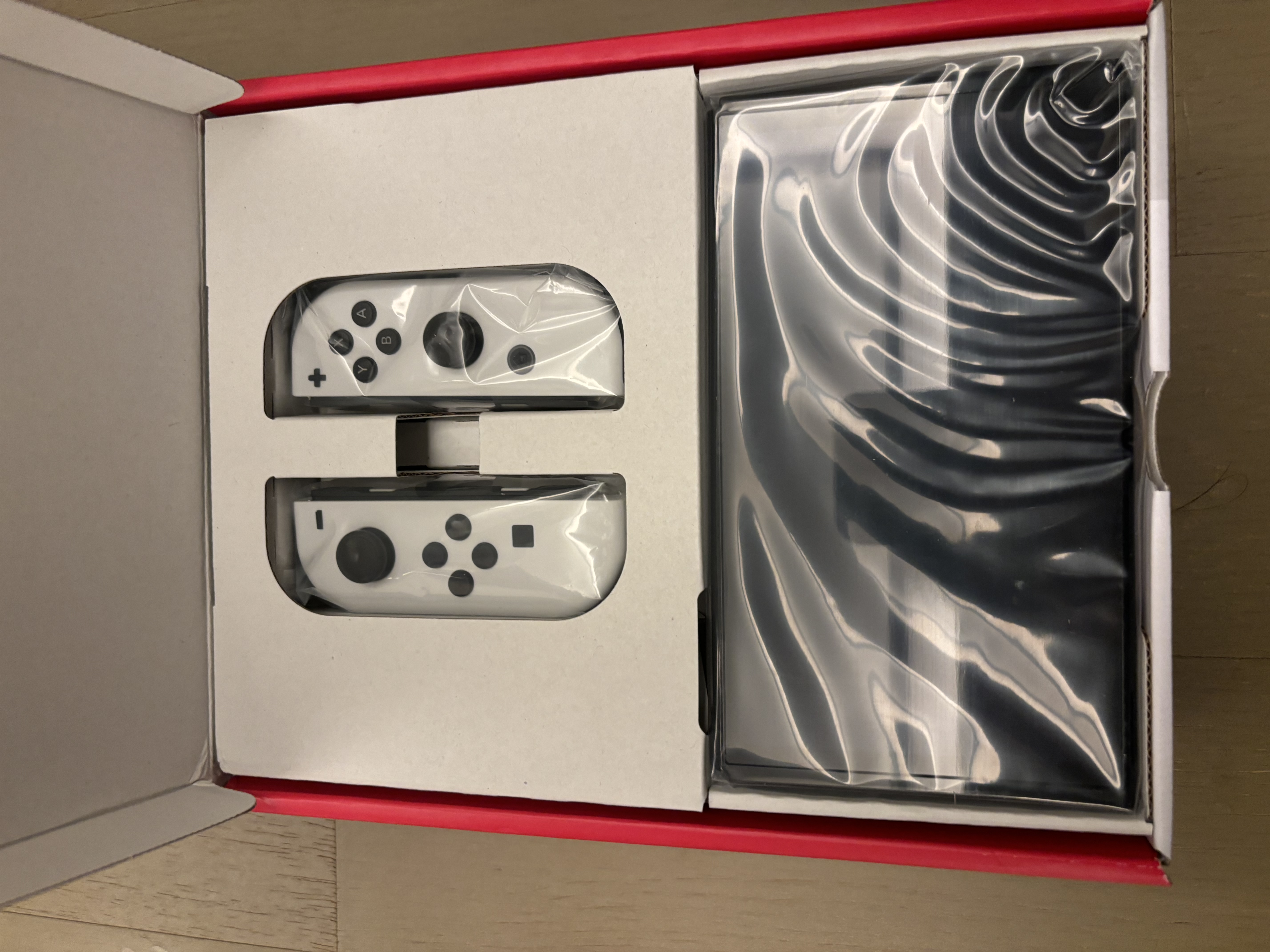 任天堂（Nintendo）【国内保税仓】Switch2/1代 OLED/续航加强日版/港版便携家用ns体感游戏机掌机 日版OLED白色64GB保税（赠共享会员） 实拍图