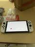 任天堂（Nintendo）【国内保税仓】Switch2/1代 OLED/续航加强日版/港版便携家用ns体感游戏机掌机 日版OLED白色64GB保税（赠共享会员） 实拍图