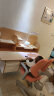 护童（Totguard）儿童学习桌椅学生书桌椅可升降实木写字桌课桌椅套装120cm带书柜 习惯星_新实木+扶手椅_红+萌芽灯 实拍图