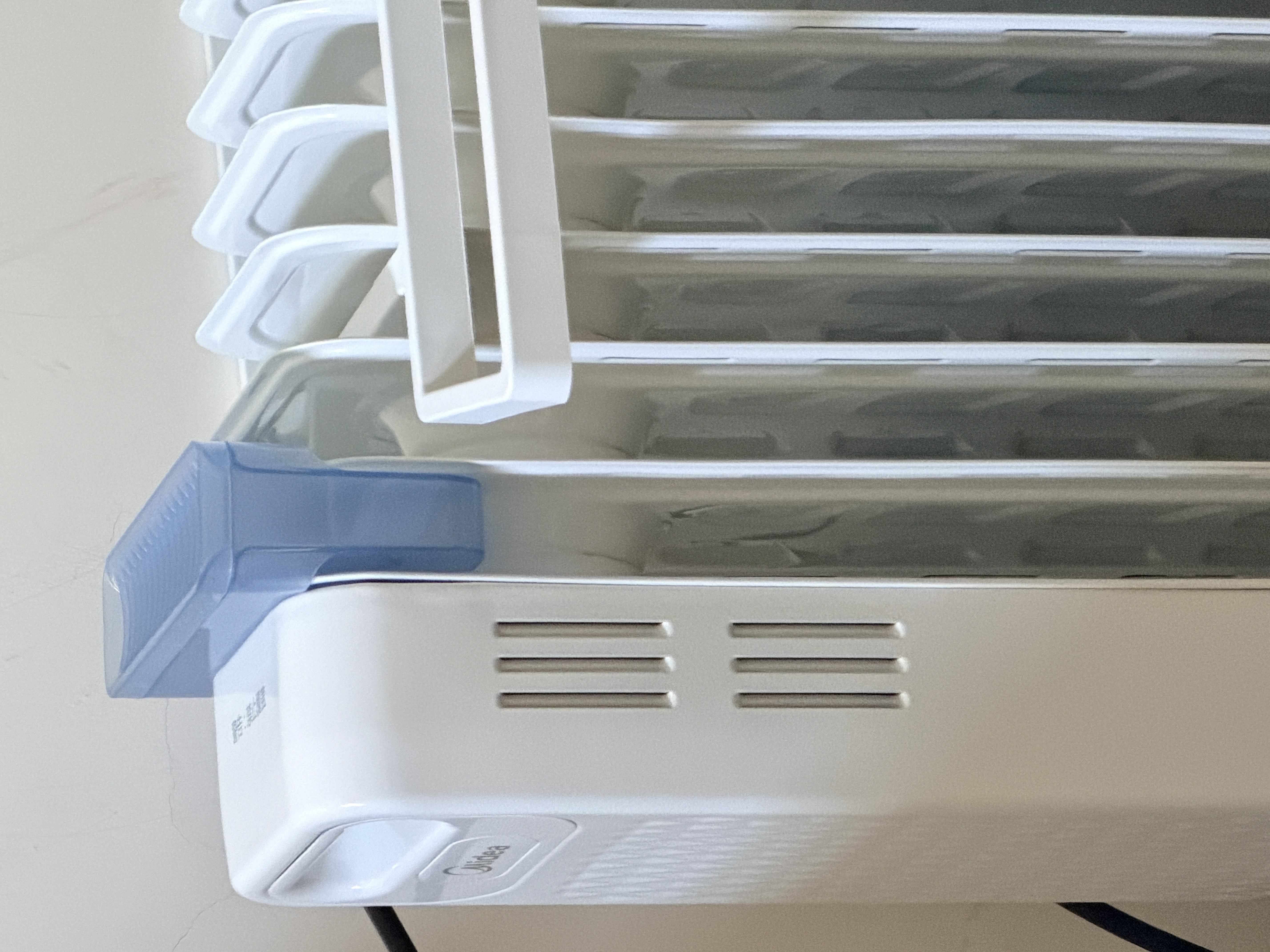 美的（Midea）【品质推荐】电热油汀取暖器/电暖器/电暖气家用/烤火炉/13片节能速热油酊/加热器/烘衣加湿HYX22N 实拍图