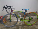 EG7公路山地自行车成人死飞变速通勤越野旅行城市单车儿童男青少年 星光40刀-彩虹色 26寸24速 实拍图