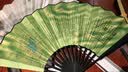 王星记扇子创意饰品中国风折扇古风杭州非遗丝绸绢扇10寸男士折叠扇礼盒 百脸谱 10寸 实拍图