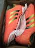 青训儿童足球鞋碎钉男士足球鞋平底TF中小学生体育训练人造草地  桔色 36 实拍图