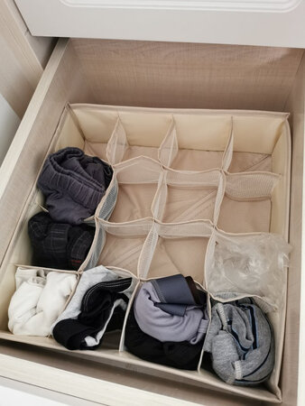 容量大小：还可以
厚薄程度：薄
实用性能：比较实用
商品材质：可水洗的布料
其他特色：大小合适