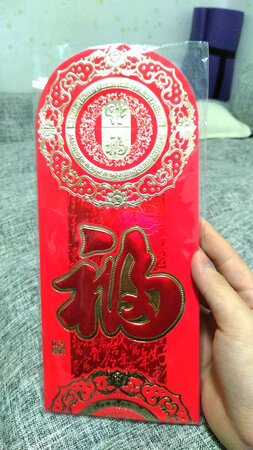 真的万元红包，你要是不包一万在里面的话都看不出来。