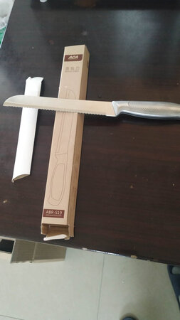 面包机不错，不足之处是放酵母的地方再盖上，不方便往里放！