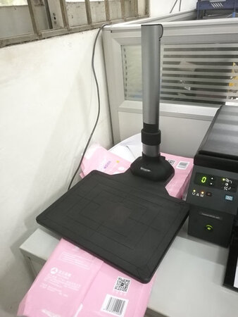 还挺好用的，很方便，再也不用开盖子翻来翻去了，扫描速度也快，很清晰