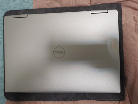 我的xps7390装里面有点空，估计老婆的9370比较合适。退不退呢？纠结