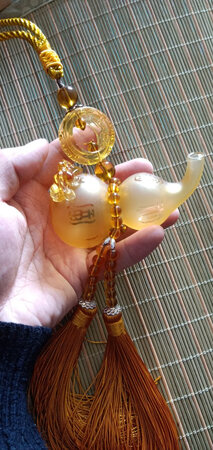 这个饰品挺好看的，香水桂花的。